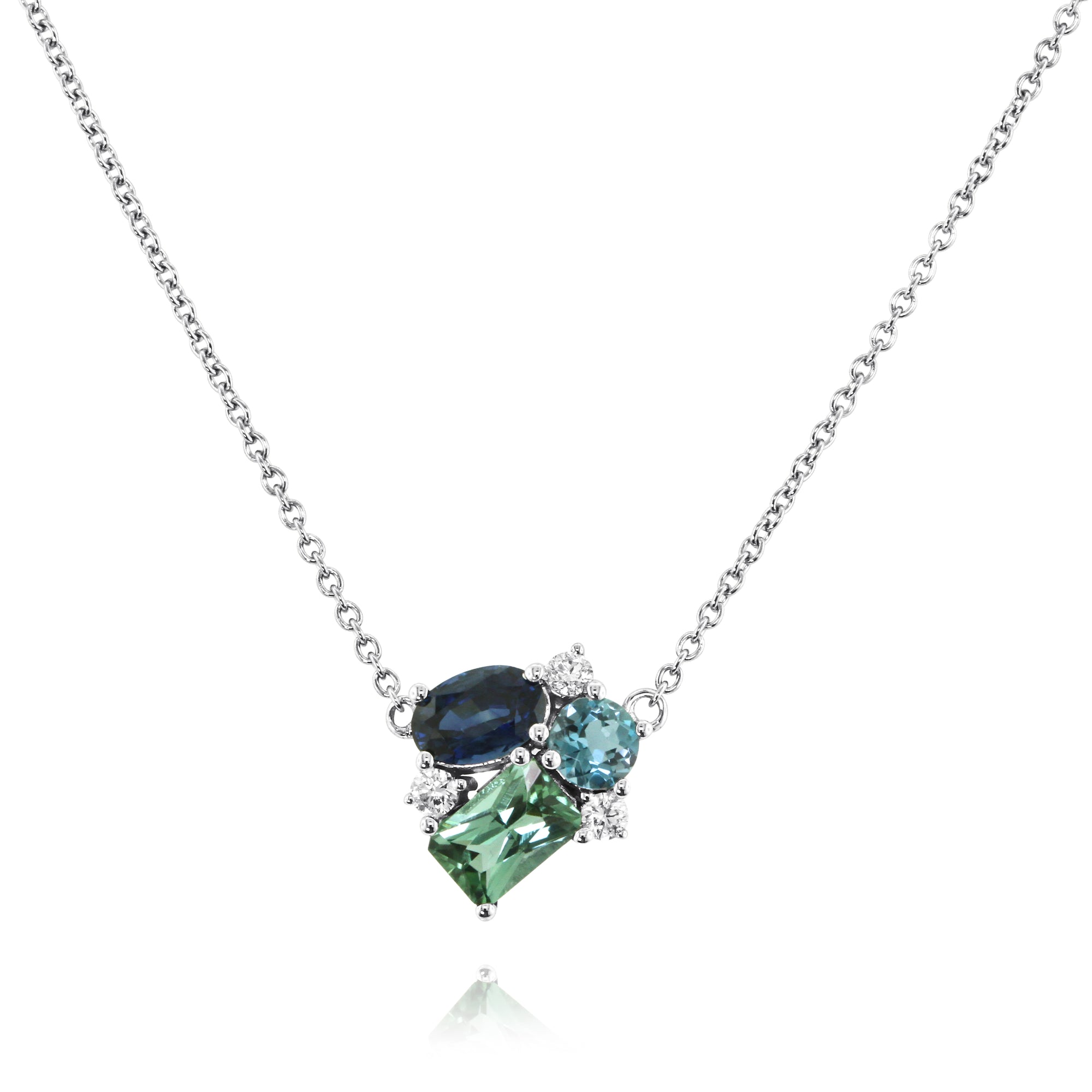 Sapphire, Tourmaline, Topaz & Diamond Necklace by Yael available at Talisman Collection Fine Jewelers in El Dorado Hills, CA and online. Sapphire, Tourmaline, and Topaz, oh my! The soft, cool-hued tones of this clustered gem necklace make it perfect for every day. The pendant features 0.58 cts of blue sapphire, 0.50 cts of rad green tourmaline, 0.32 cts of blue topaz and 0.09 cts of diamonds set in 14k white gold on a 16" chain.