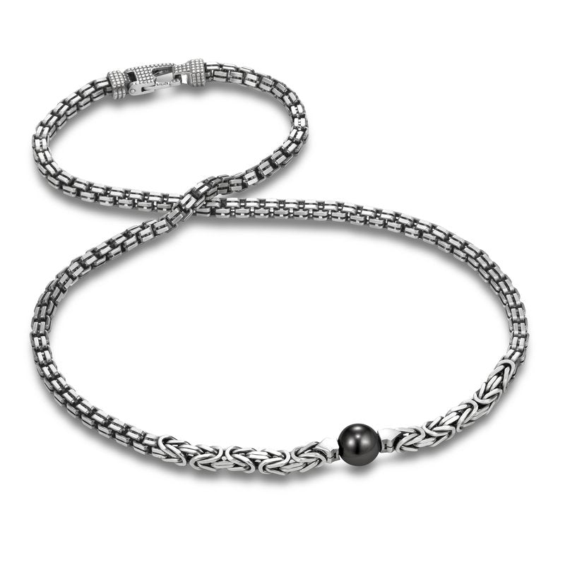 Sorrento Mixed Chain Tahitian Pearl Necklace by Mastoloni Pearls available at Talisman Collection Fine Jewelers in El Dorado Hills, CA and online. This mixed chain necklace is a luxurious piece of jewelry made with sterling silver and Tahitian pearls ranging from 11 to 12 mm in size. This bold necklace offers a classic and sophisticated look. 22"