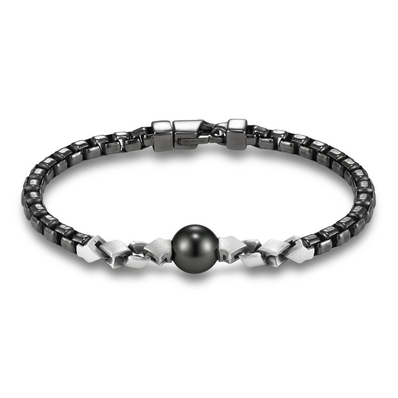 Sorrento Tahitian Pearl Bracelet by Mastoloni Pearls available at Talisman Collection Fine Jewelers in El Dorado Hills, CA and online. The Sorrento Tahitian Pearl Bracelet features a dark 11-12mm Tahitian pearl, hand-selected and set in a blackened sterling silver bracelet. At 8.5" in length, this bracelet is a strong statement piece you'll want to wear every day.