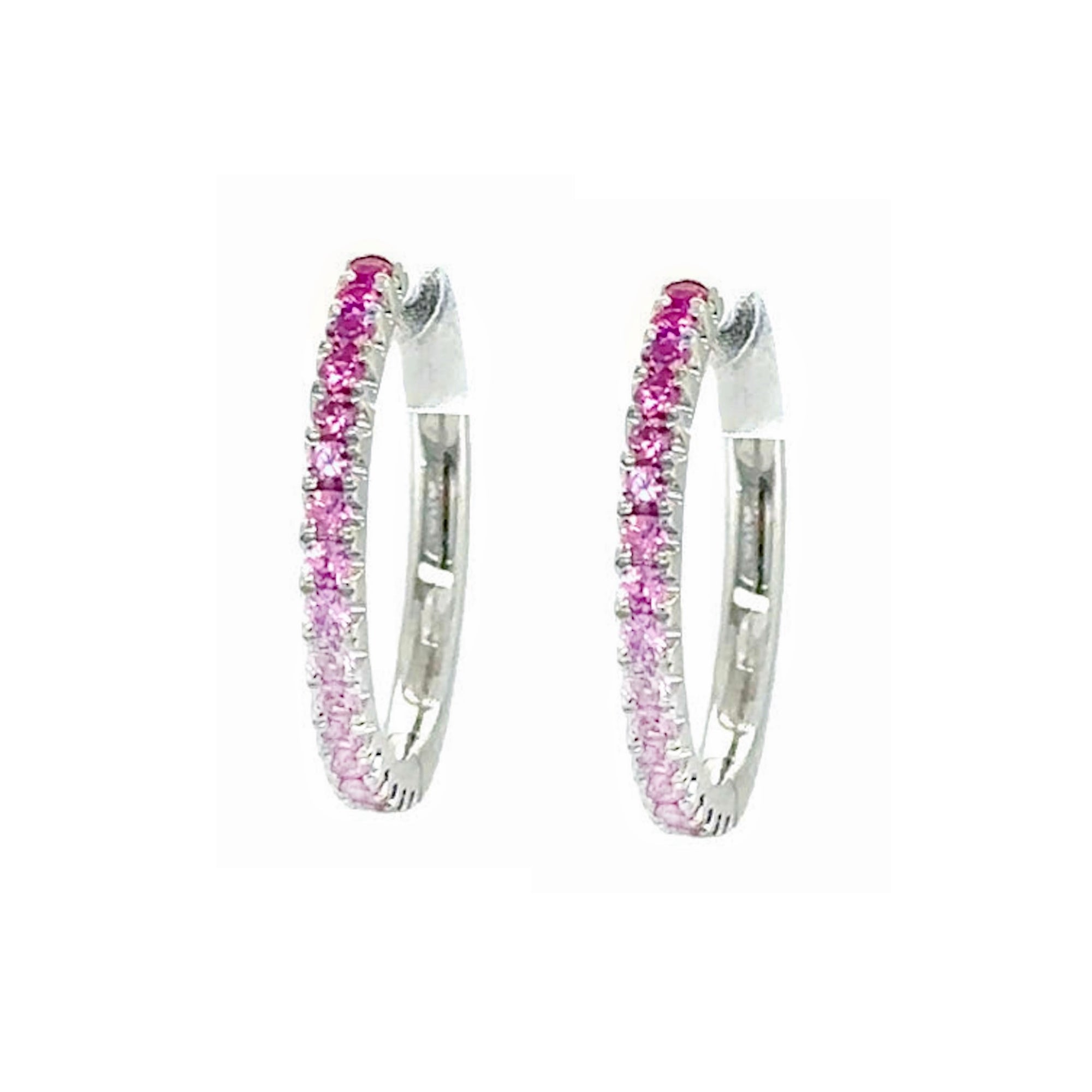 Ombre Pink Sapphire & 18k White Gold Hoop Earrings  by Lisa Nik available at Talisman Collection Fine Jewelers in El Dorado Hills, CA and online. Think Pink! These 18k white gold, hinged ,hoop earrings feature .39 carats of graduated color pink sapphires. Their classic design and inherent femininity up make them a lovely choice for everyday. Lisa Nik's gemstones are earth-mined, natural, and untreated, showcasing their unique and untouched beauty. 
