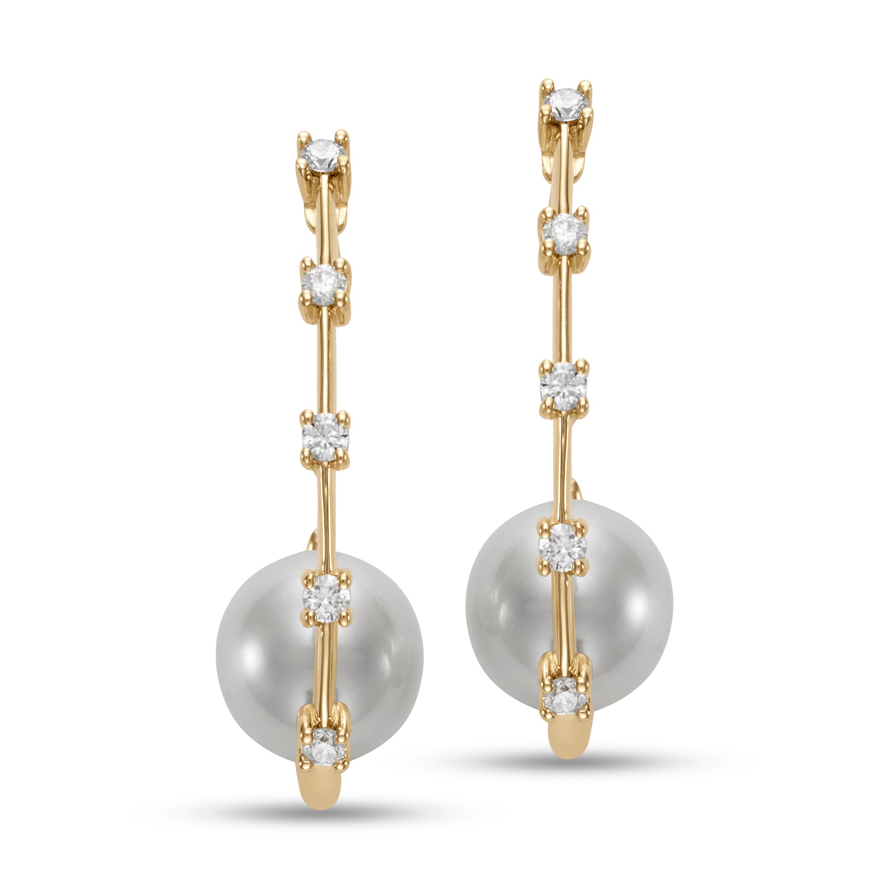 Cinque Diamond & Pearl Hoop Earrings by Mastoloni available at Talisman Collection Fine Jewelers in El Dorado Hills, CA and online. Perfectly polished and exquisitely designed, these luxurious earrings are adorned with .33 cts of sparkling prong-set diamonds and 9-9.5 mm freshwater pearls. A flawless combination of sophistication and elegance crafted in 18k yellow gold.