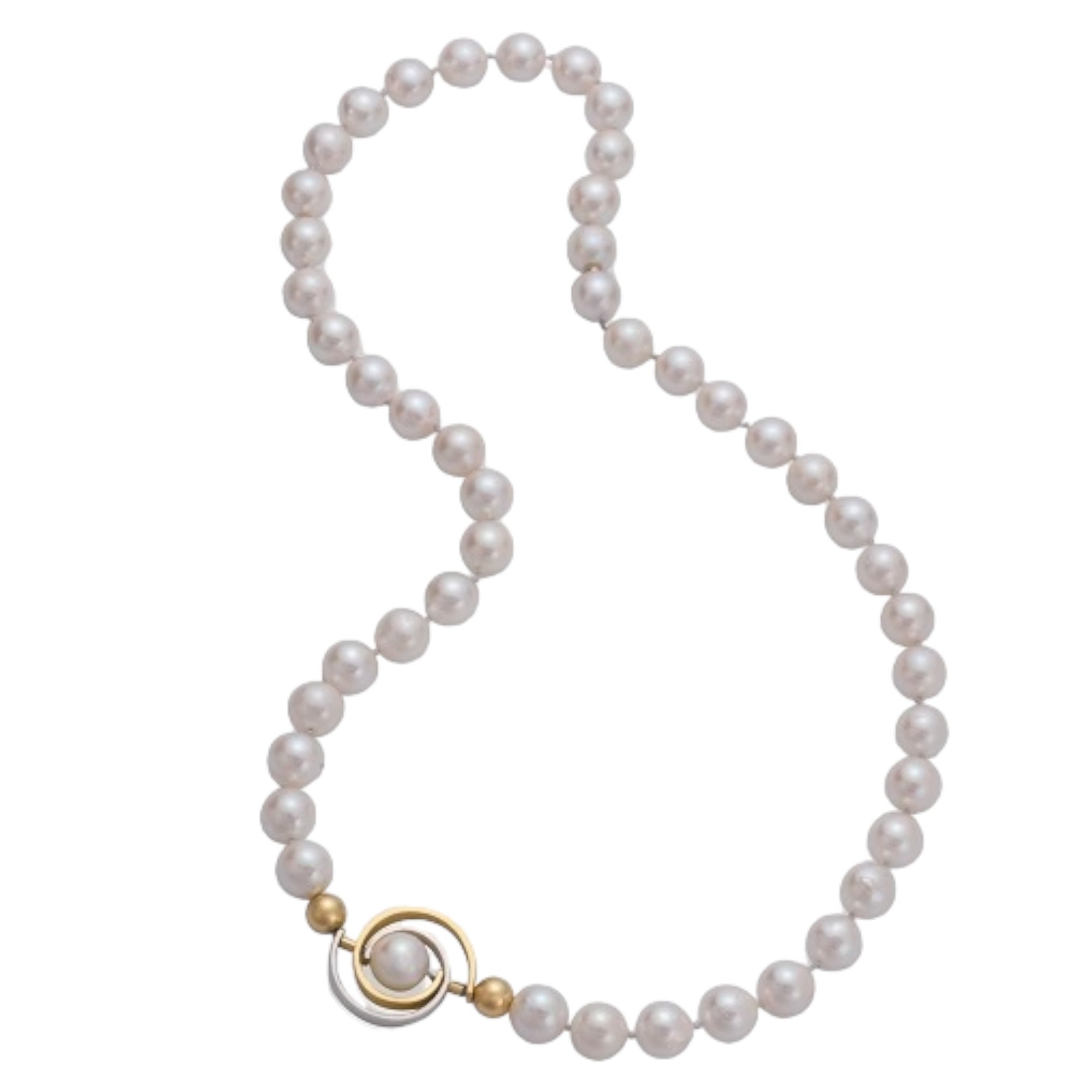Orbit Pearl 2-tone Necklace by Martha Seely vailable at Talisman Collection Fine Jewelers in El Dorado Hills, CA and online. Stats: Experience the stunning beauty of the Orbit Pearl 2-tone Necklace by Martha Seely, featuring an exquisite 18" pearl necklace adorned with a unique spiral design and lustrous Japanese Akoya pearls. Surrounding the pearls on either side are 6mm heavy wall gold beads, adding an elegant touch to this eye-catching piece of jewelry.