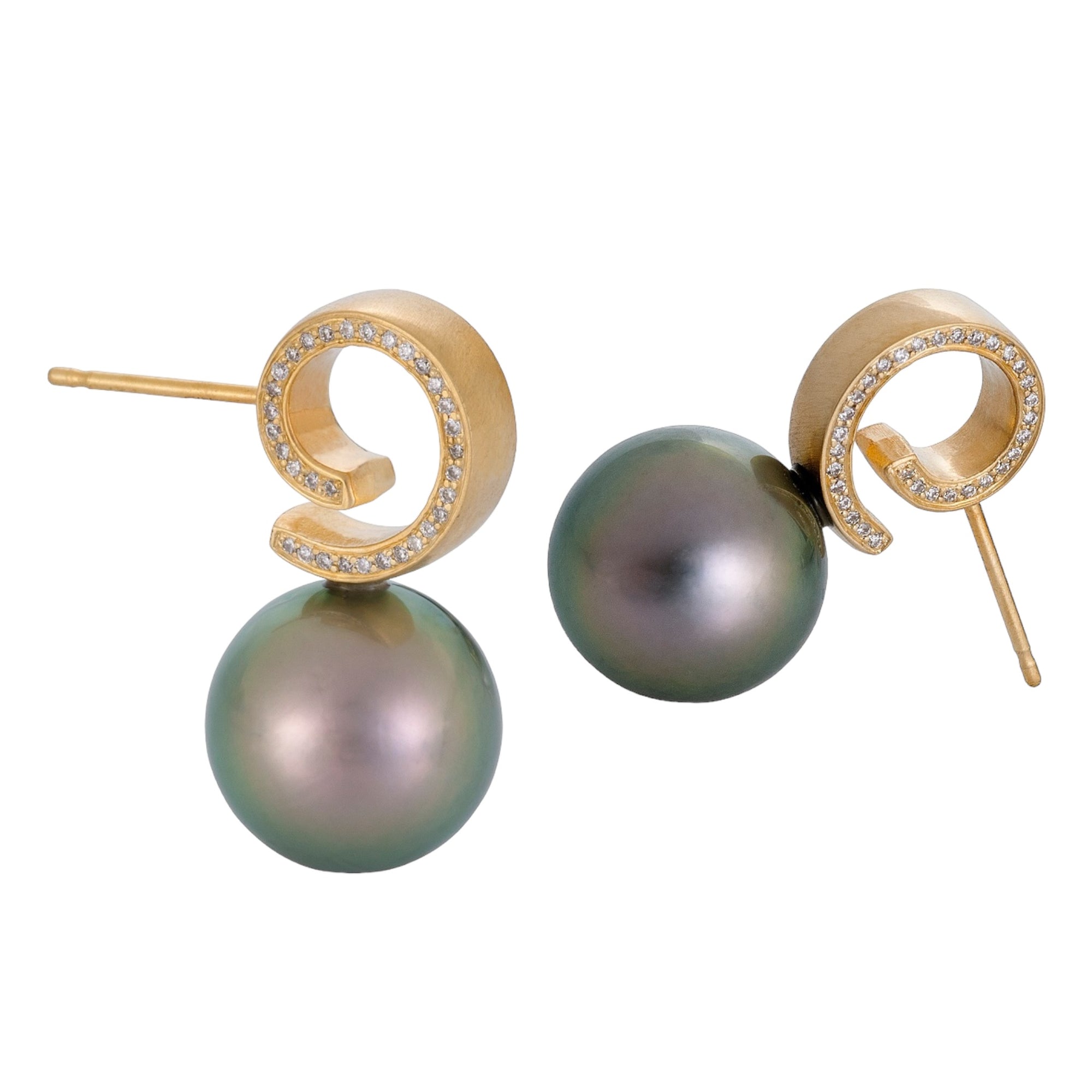 Cirrus Tahitian Pearl Earrings  by Martha Seely available at Talisman Collection Fine Jewelers in El Dorado Hills, CA and online. Stats: The swirling clouds serve as the muse for these stunning 14k earrings. Adorned with Tahitian Pearls and a row of 32 glimmering diamonds totaling .9 cts, each earring boasts a subtle yet elegant satin finish, perfect for both daywear and formal events. Measuring 0.9" from top to bottom, these earrings exude an air of sophistication and refinement.
