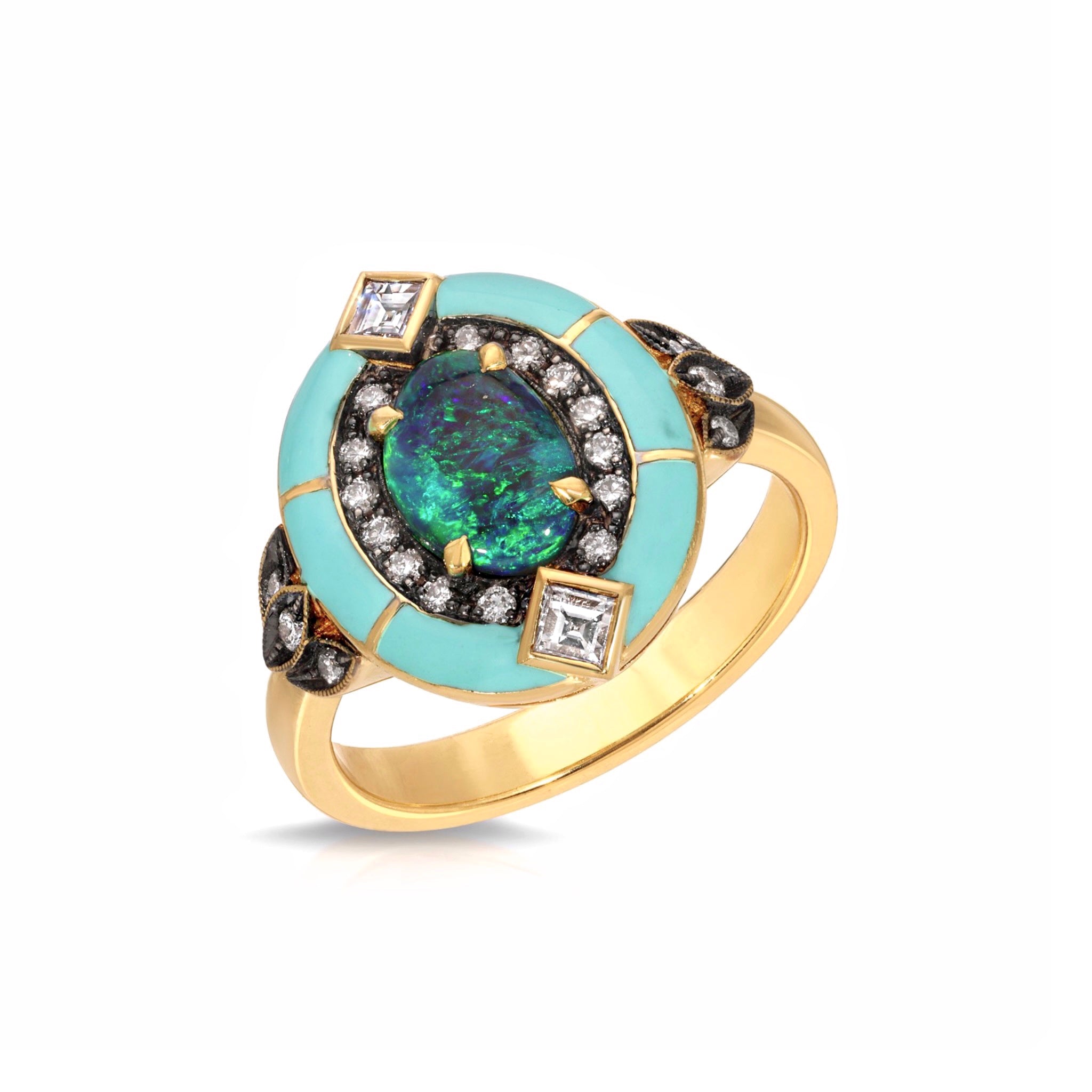 Emerald Enamel Ring by Lord Jewelry available at Talisman Collection Fine Jewelers in El Dorado Hills, CA and online. This lively statement ring is sure to make a big impression! Crafted in 18k gold, this ring features a vibrant 0.96 ct emerald center stone, surrounded by enamel and 0.18 ct of small diamonds. Accented with two princess cut diamonds totaling 0.14 cts. and a deco influenced design this ring will dazzle!