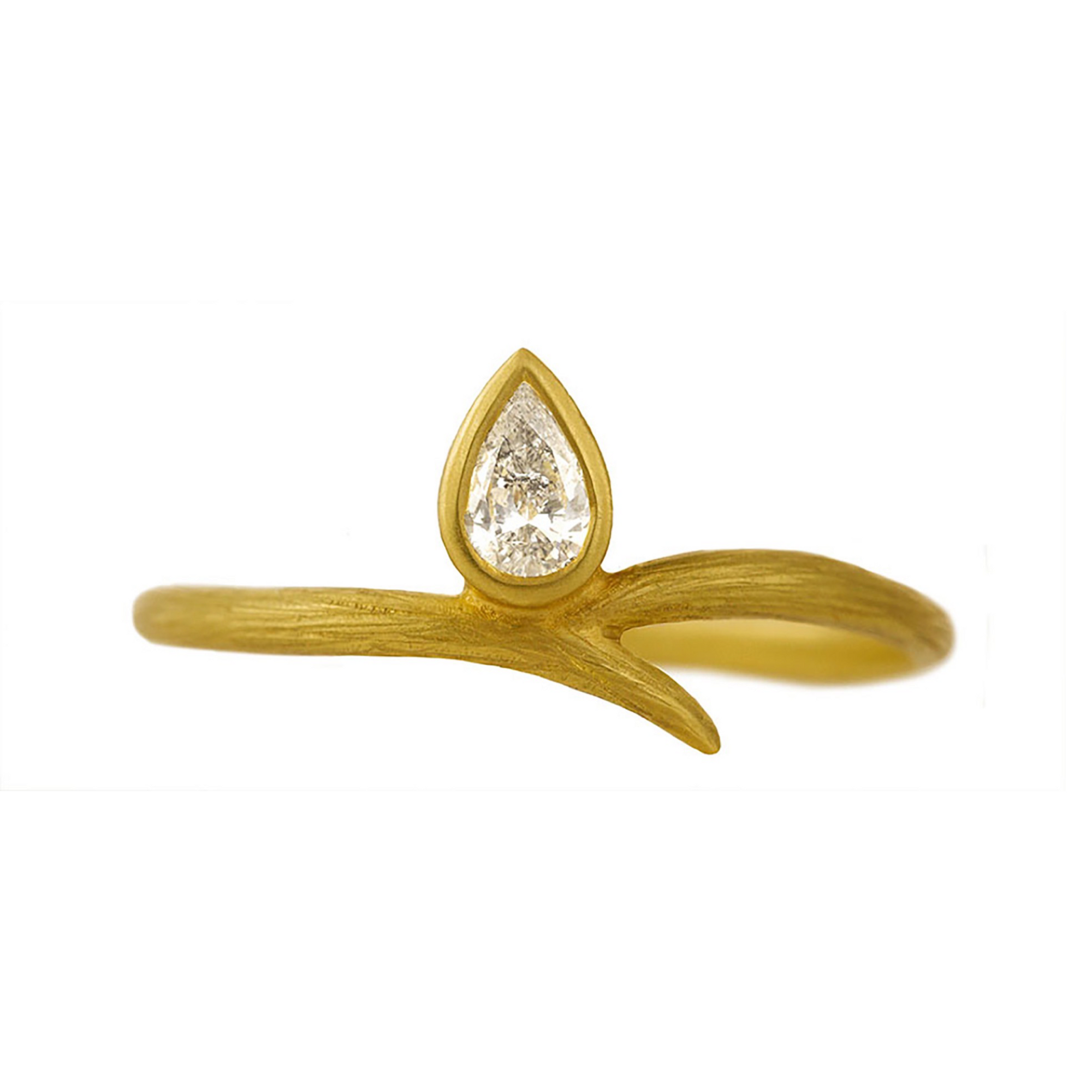 Petite Vine Diamond Ring by Laurie Kaiser available at Talisman Collection Fine Jewelers in El Dorado Hills, CA and online. Crafted from 18k yellow gold, this ring features a single pear-shaped white diamond with a weight of 0.12 cts. The diamond is set on a delicate vine-like band, which creates a natural and elegant look; perfect for everyday wear. 