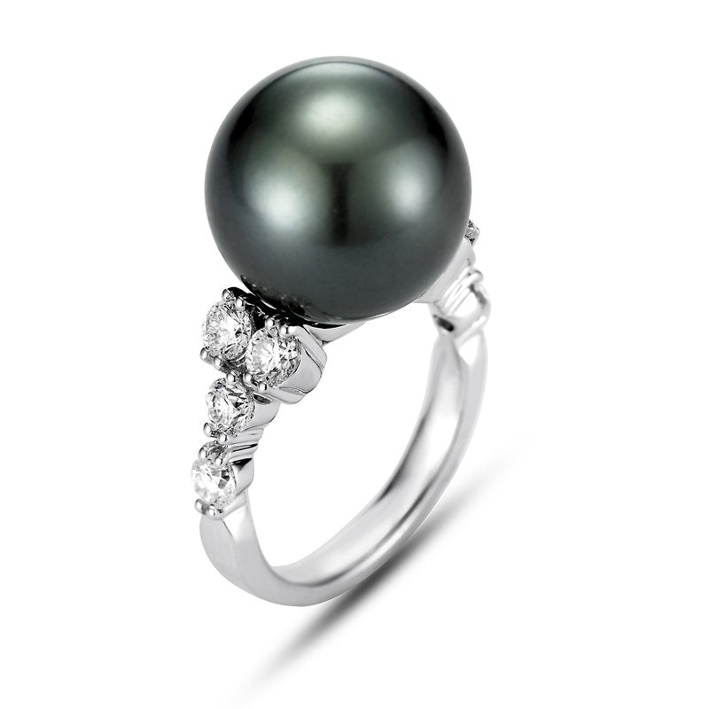 Limited Edition Tahitian Pearl and Diamond Quattro Ring by Mastolonii available at Talisman Collection Fine Jewelers in El Dorado Hills, CA and online. The epitome of timeless elegance, our Limited Edition Tahitian Pearl and Diamond Quattro Ring features a flawless 14 mm Tahitian pearl set in 18k white gold. Accented with 1.00 cts of dazzling diamonds this ring exudes sophistication and is ready for you to wear to your next cocktail party!