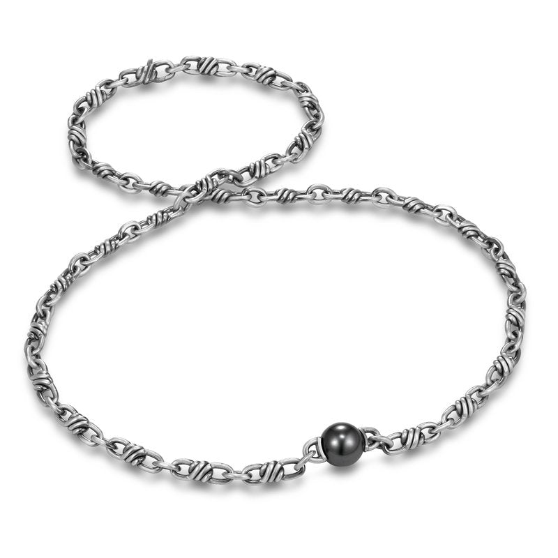 Sorrento Link Tahitian Pearl Men's Necklace by Mastoloni Pearls available at Talisman Collection Fine Jewelers in El Dorado Hills, CA and online. With a striking 11-12 mm Tahitian pearl, this necklace will set you apart from the crowd. Made with sleek sterling silver and measuring 22 inches in length, it's the perfect way to add an adventurous touch to your look. Rock this must-have piece with confidence!