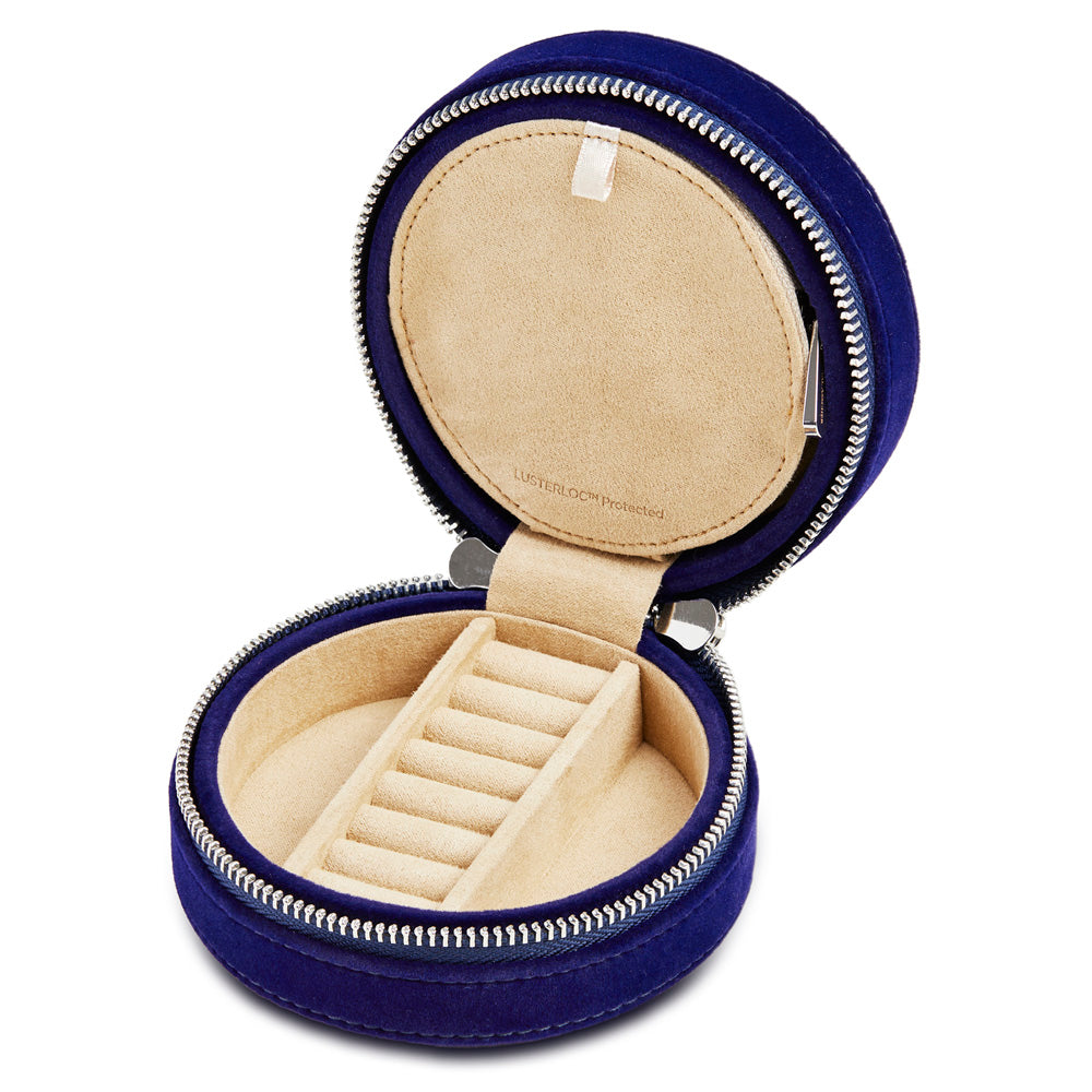 Royal Asscher Round  Jewelry Zip Case by Wolf available at Talisman Collection Fine Jewelers in El Dorado Hills, CA and online. Royal Asscher Diamond Company Square Jewellery Zip Case features deep blue velvet with elaborate tulip embroidery exterior, mirror, storage and hidden necklace hook section to organise your jewellery in style. Includes LusterLoc™ anti-tarnish lining and silver finish zip and details.