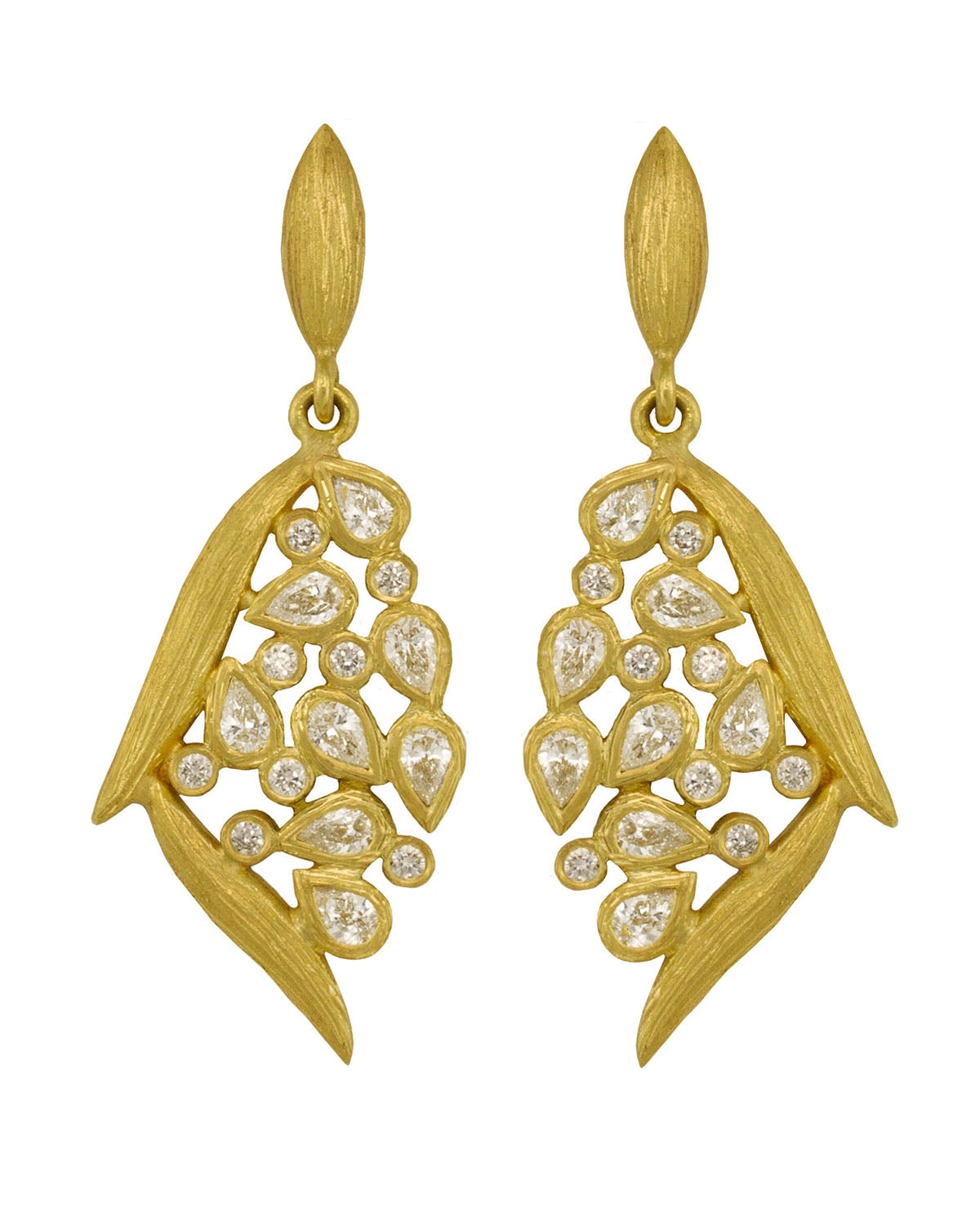 Diamond Leaf and Vine Drop Earring by Laurie Kaiser available at Talisman Collection Fine Jewelers in El Dorado Hills, CA and online. Delight in our 18k gold Diamond Leaf and Vine Drop  Earrings, featuring 0.69 cts of pear-cut diamonds and 0.16 cts of round brilliant diamonds, elegantly nestled between two delicately textured leaves. Enjoy the classic post-back design for both ease and style. These earrings epitomize understated sophistication.