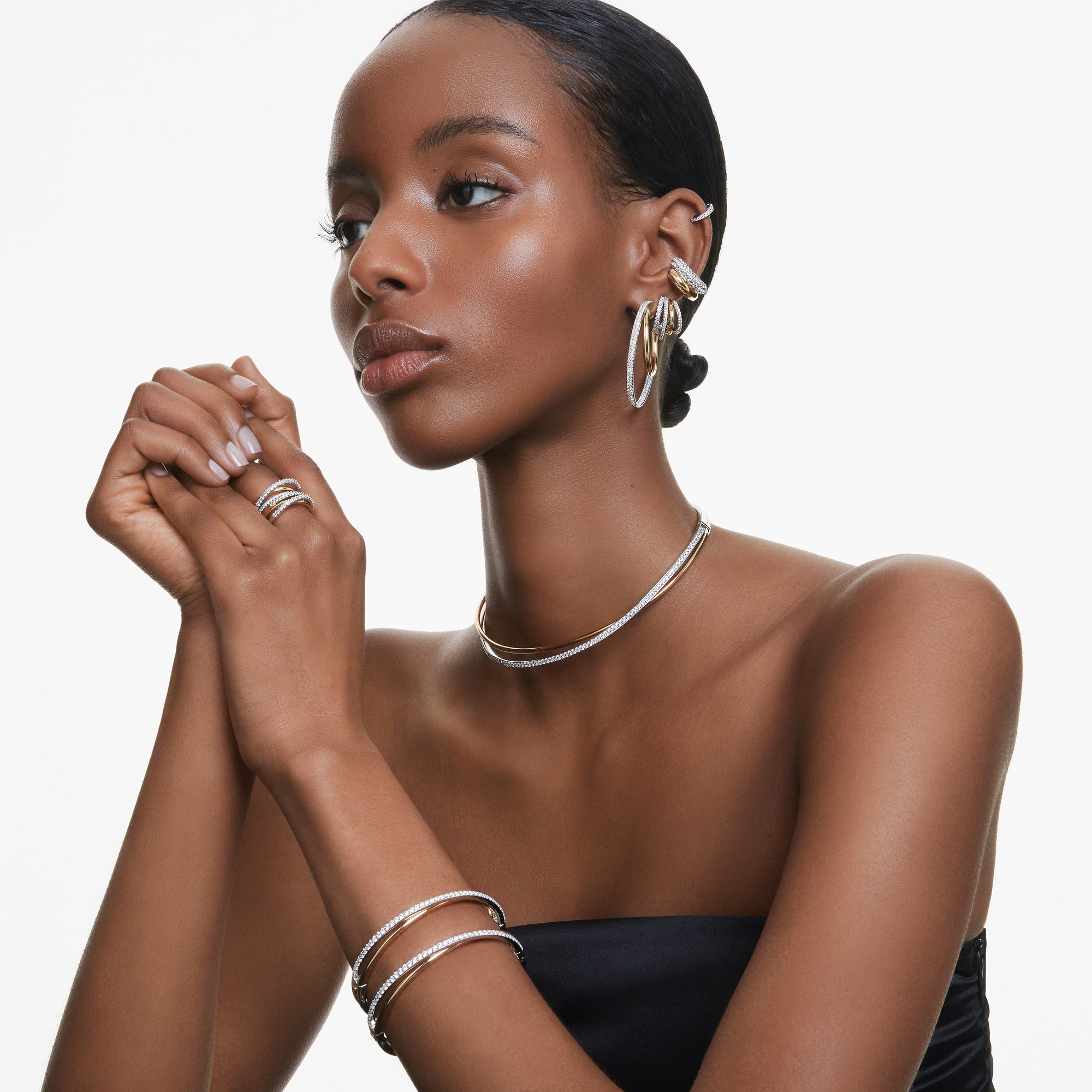 Two-Tone Hyperbola Hoop Earrings by Swarovski