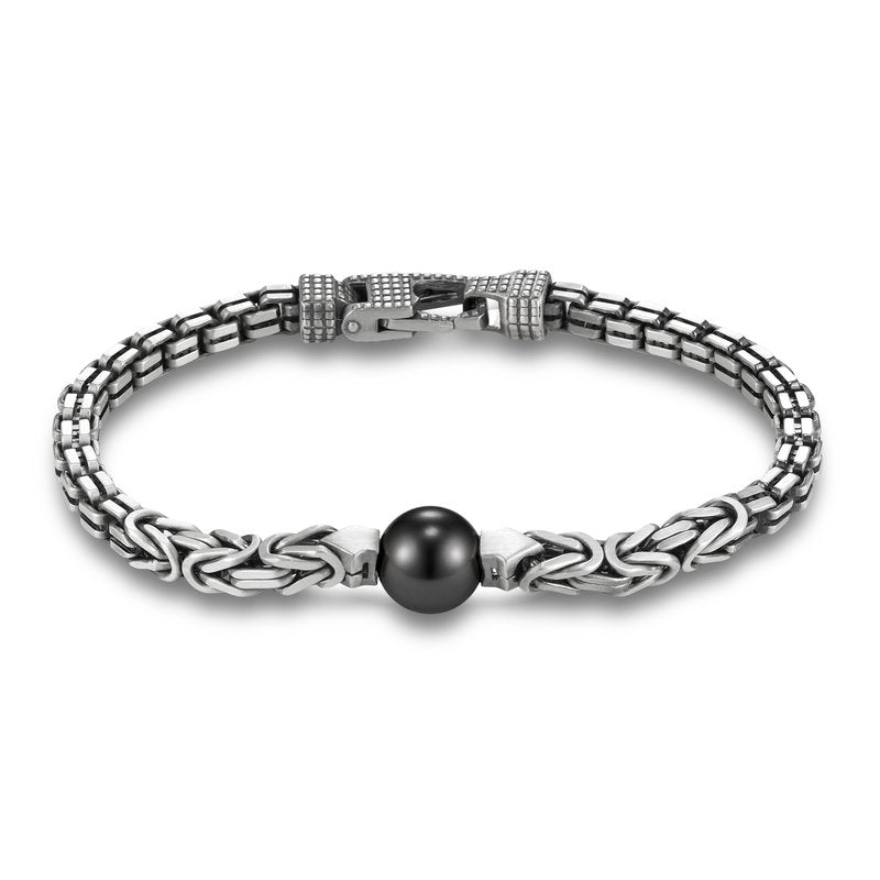 Sorrento Mixed Chain Tahitian Pearl Men's Bracelet by Mastoloni Pearls available at Talisman Collection Fine Jewelers in El Dorado Hills, CA and online. Masterfully crafted using a combination of 11-12 mm Tahitian pearls and sterling silver, the Sorrento Mixed Chain Tahitian Pearl Bracelet by Mastoloni features a handsome design. The bracelet measures 8.5" in length, providing a comfortable and secure fit for any wrist size. 