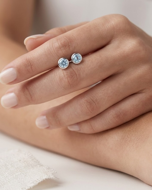 Ostbye Blue Topaz Bezel Stud Earrings