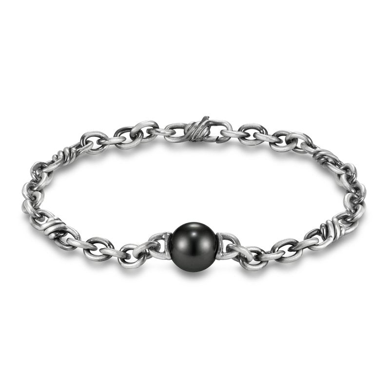 Sorrento Link Tahitian Pearl Men's Bracelet by Mastoloni Pearls available at Talisman Collection Fine Jewelers in El Dorado Hills, CA and online. Luminous, wearable, exotic beauty! The 11-12 mm Tahitian pearls are perfectly complemented by the sterling silver, creating a stunning contrast. The 8.5" length ensures a comfortable fit and easy everyday style. 