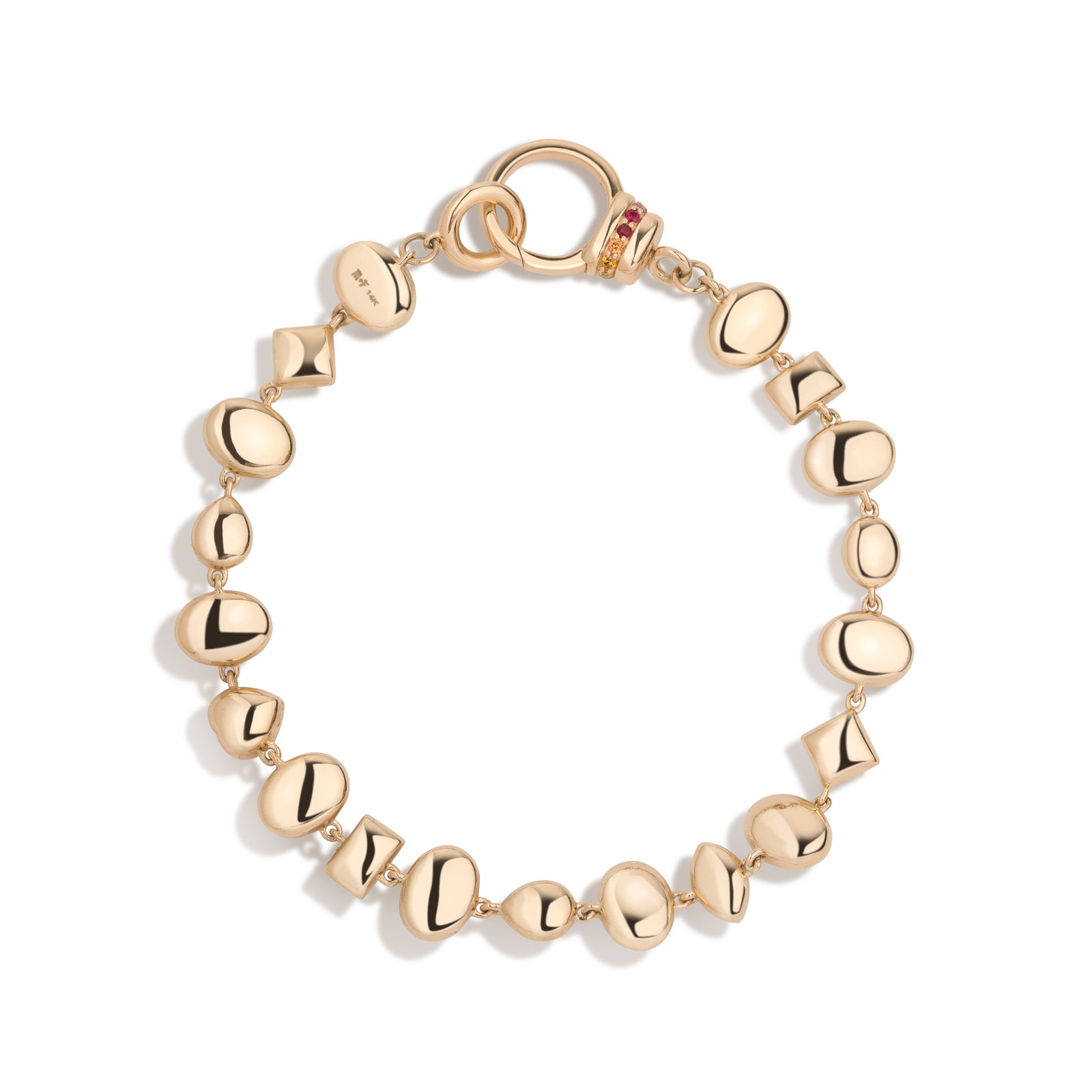 Confetti Bezel Bracelet by Mined + Found available at Talisman Collection Fine Jewelers in El Dorado Hills, CA and online.  A fête for the wrist, the confetti bracelet features a sublime gathering of gems in a rainbow of colors and array of fancy shapes. Each link is meticulously finished in lustrous 14k yellow gold & features a smooth, closed backing. This party of gems includes: opal 3.05 cts, sapphire 0.93 cts, tsavorite garnet 0.18 cts, blue topaz 0.37 cts, amethyst 0.15 cts. This 7.25" long bracelet is
