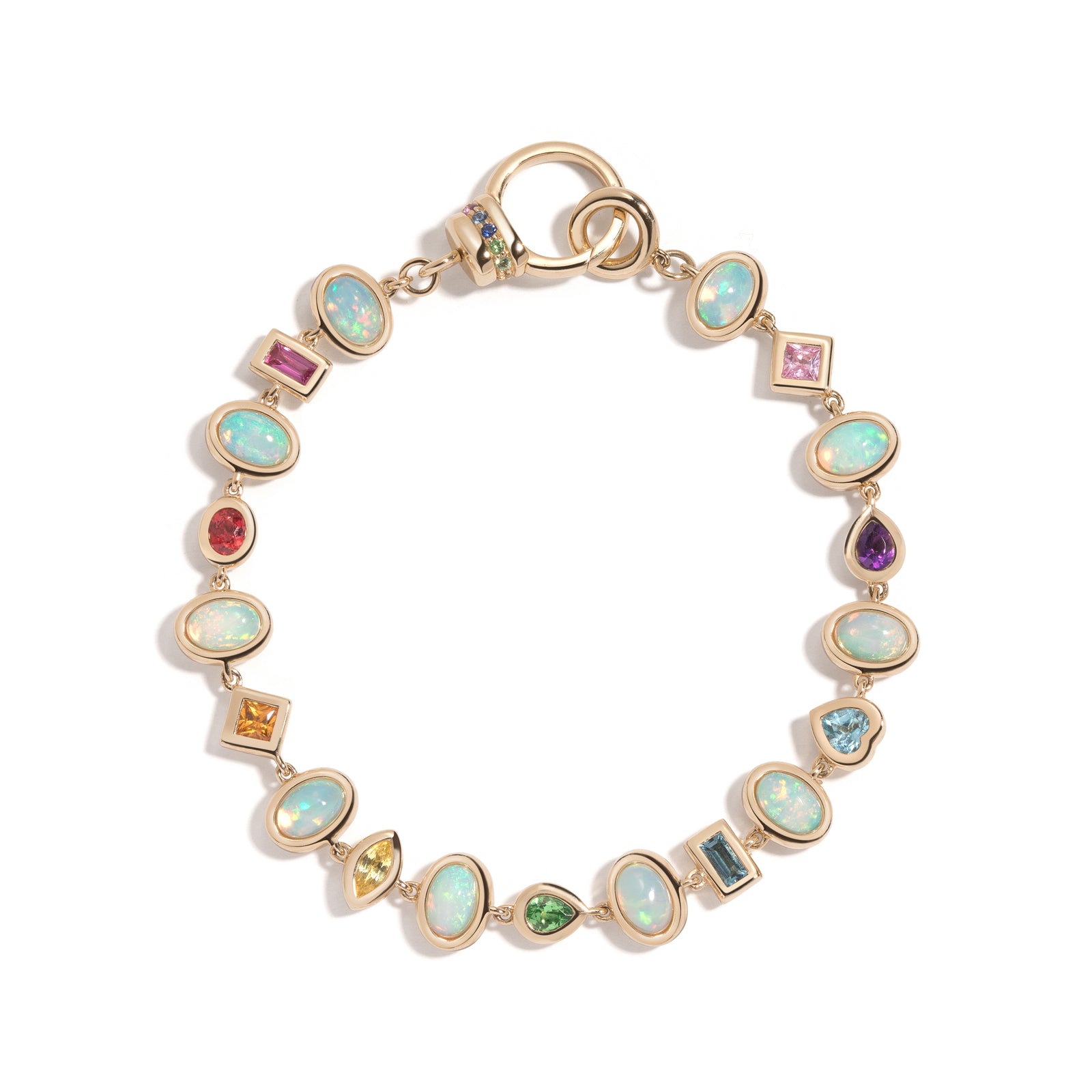 Confetti Bezel Bracelet by Mined + Found available at Talisman Collection Fine Jewelers in El Dorado Hills, CA and online.  A fête for the wrist, the confetti bracelet features a sublime gathering of gems in a rainbow of colors and array of fancy shapes. Each link is meticulously finished in lustrous 14k yellow gold & features a smooth, closed backing. This party of gems includes: opal 3.05 cts, sapphire 0.93 cts, tsavorite garnet 0.18 cts, blue topaz 0.37 cts, amethyst 0.15 cts. This 7.25" long bracelet is