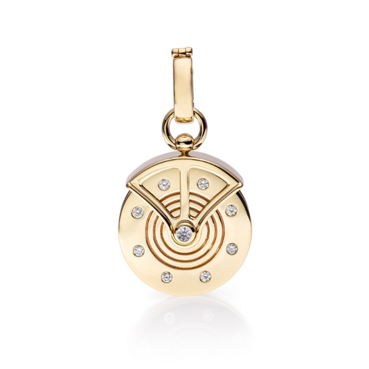 Strength Pulley Charm by Mined + Found available at Talisman Collection Fine Jewelers in El Dorado Hills, CA and online. The 14k gold strength pulley pendant is imbued with emotional themes of resilience and bravery, captured through a silhouette inspired by antique pulley wheels. The fully rotational wheel is adorned with a glowing rainbow moonstone cabochon at center and a frame of 0.11 cts of sparkling diamonds. The enhancer bail opens at back to allow it to be linked directly to large links, over your f