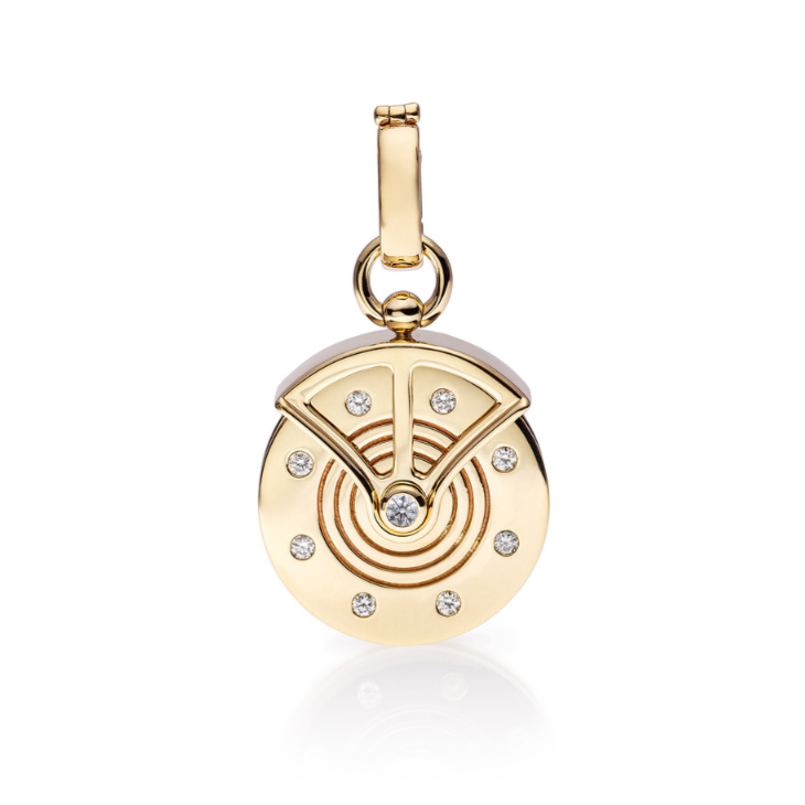 Strength Pulley Charm by Mined + Found available at Talisman Collection Fine Jewelers in El Dorado Hills, CA and online. The 14k gold strength pulley pendant is imbued with emotional themes of resilience and bravery, captured through a silhouette inspired by antique pulley wheels. The fully rotational wheel is adorned with a glowing rainbow moonstone cabochon at center and a frame of 0.11 cts of sparkling diamonds. The enhancer bail opens at back to allow it to be linked directly to large links, over your f