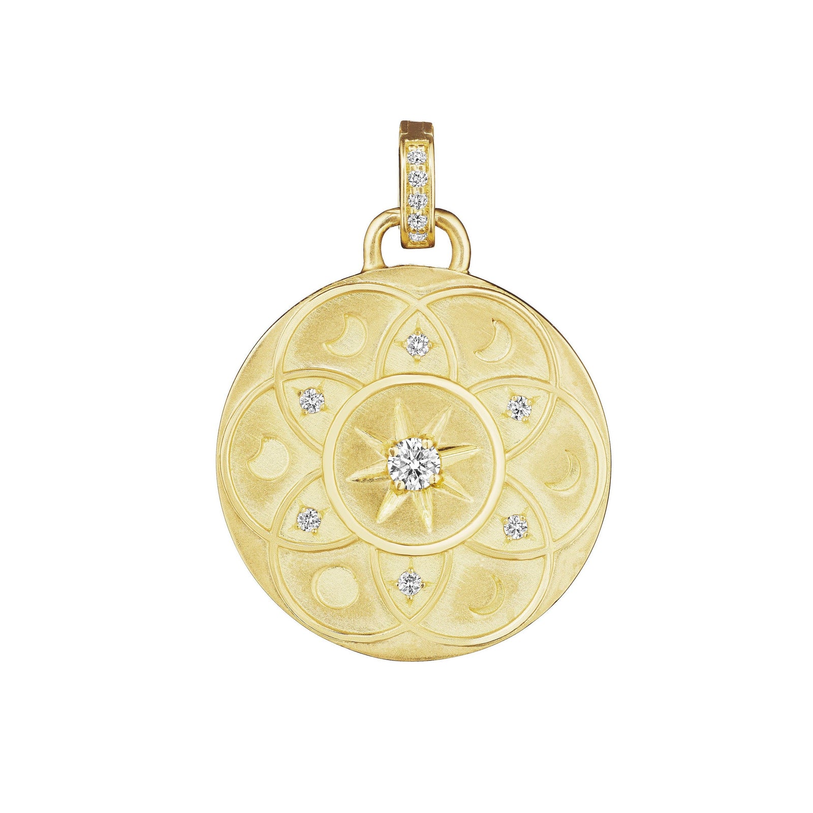 Lunar Medallion Charm by Penny Preville available at Talisman Collection Fine Jewelers in El Dorado Hills, CA and online. Unveil your inner enchantress with the 18k Lunar Medallion, a piece that captures the magic of the cosmos. Adorned with .20 cts of shimmering diamonds, this charm brings a touch of the heavens to your jewelry collection. Crafted in luminous 18k gold, its intricate design evokes a sense of wonder and mystery, perfect for those who are drawn to the beauty of the night sky.
