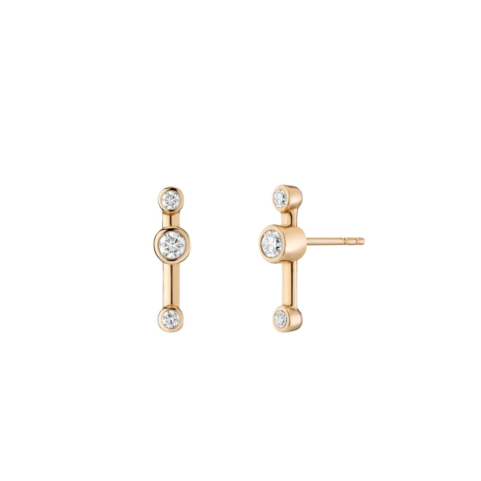 Crossroad Diamond Stud by Mined + Found available at Talisman Collection Fine Jewelers in El Dorado Hills, CA and online. Representative of a segment in time, the Diamond Crossroad Studs may be worn with the diamond positioned close to either end cap, or centered in the middle. With 0.27 cts of diamond, these 14k yellow gold earrings make a delicate statement for a primary piercing, and are so streamlined that they're easily worn in secondary and cartilage piercings as well. 