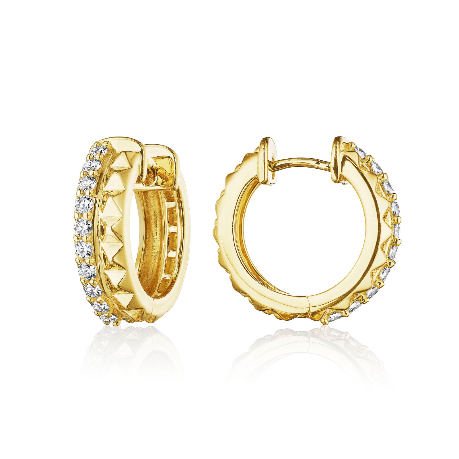 Two Row Diamond Hoop Earrings by Penny Preville available at Talisman Collection Fine Jewelers in El Dorado Hills, CA and online. These classic huggie hoop earrings bring a fresh twist with their geometric design, featuring a single row of diamonds totaling .30 cts. Crafted in 18k gold, they offer just the right amount of sparkle for everyday wear or special occasions. At 14mm in diameter, they’re lightweight and comfortable, making them an effortless addition to your look. Simple yet distinctive, they add 