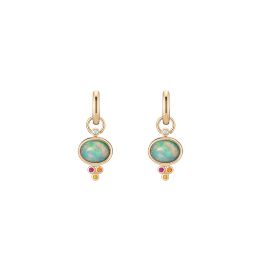 Opal Trio Charm earrings by Mined + Found available at Talisman Collection Fine Jewelers in El Dorado Hills, CA and online.  Our warm mix of pink, orange and yellow sapphires accent fiery opal cabochons hugged by golden 14k settings. Charms are removable from their accompanying hoops, allowing for a separate + alternative look of hoops alone. 