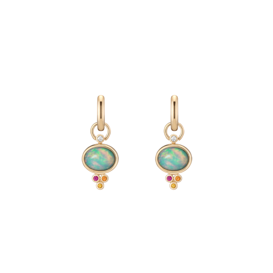 Opal Trio Charm earrings by Mined + Found available at Talisman Collection Fine Jewelers in El Dorado Hills, CA and online.  Our warm mix of pink, orange and yellow sapphires accent fiery opal cabochons hugged by golden 14k settings. Charms are removable from their accompanying hoops, allowing for a separate + alternative look of hoops alone. 