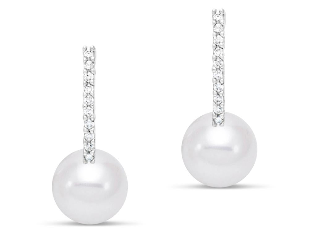 White Freshwater Pearl Drop Earrings by Mastoloni available at Talisman Collection Fine Jewelers in El Dorado Hills, CA and online. These chic huggie earrings combine 7.5–8mm white freshwater pearls with the sparkle of .10 cts of diamonds, all set in 14k gold. The pearls dangle elegantly, framed by the glimmering diamonds of the sleek gold hoops. Dressed up or worn casually, one thing is for sure, you'll love them forever! 