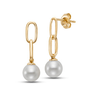 Freshwater Pearl Gold Link Earrings by Mastoloni available at Talisman Collection Fine Jewelers in El Dorado Hills, CA and online. Crafted in 14k yellow gold, these earrings showcase a striking link design with a 6–6.5mm freshwater pearl drop. The geometric gold links contrast beautifully with the natural beauty of the pearl, offering a chic update to traditional styles. Perfect for adding a sophisticated touch to your everyday ensemble or making a subtle statement at special events. 