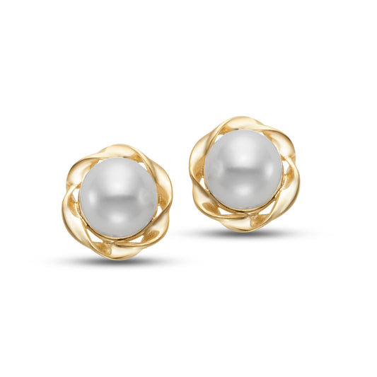 Freshwater Pearl Flower Stud Earrings by Mastoloni available at Talisman Collection Fine Jewelers in El Dorado Hills, CA and online. With 4mm freshwater pearls nestled in petite 14k yellow gold flowers, these earrings bring a lighthearted, feminine vibe to your collection. The playful design adds a fresh spin to classic pearl studs, offering a fun and flirty accent for both casual and formal styles. 