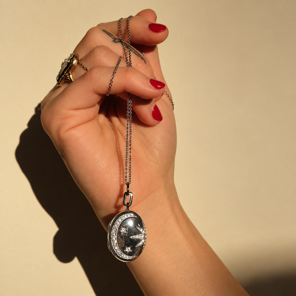 Galaxy Locket with White Sapphires by Monica Rich Kosann