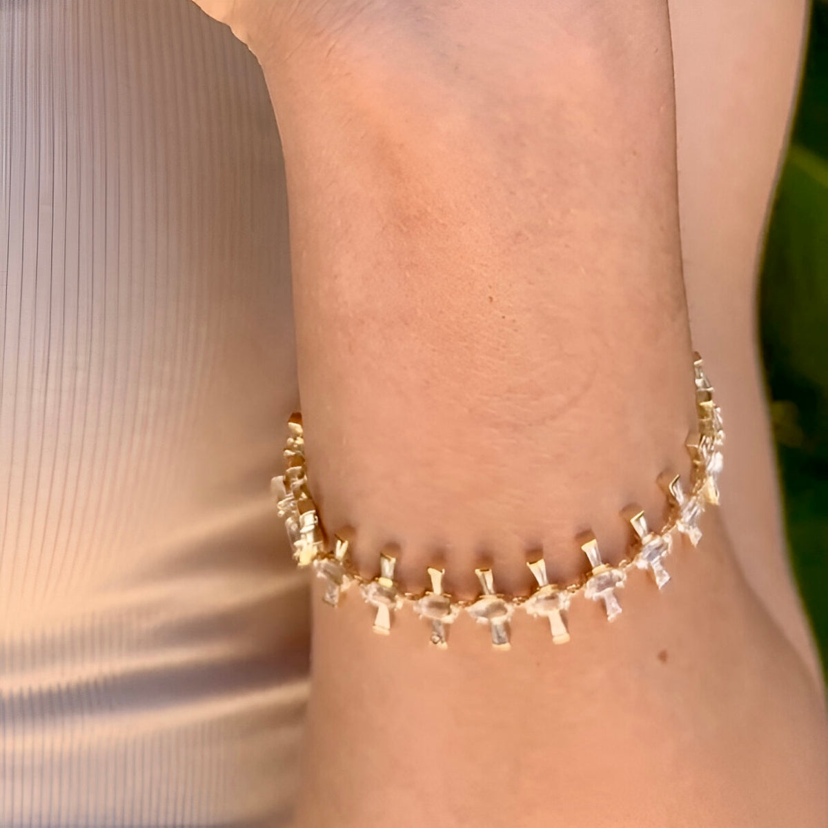 Supernova Diamond Sapphire Tennis Bracelet by Meredith Young, available at Talisman Collection Fine Jewelers in El Dorado Hills, CA and online. The Supernova Diamond Sapphire Tennis Bracelet stands as a shining example of elegance. Crafted in radiant 18k yellow gold, this exquisite piece features a breathtaking 11.5 cts of oval-cut white sapphires, gracefully flanked by 2.6 cts of tapered diamond baguettes. Inspired by celestial beauty, this bracelet is is out of the world!