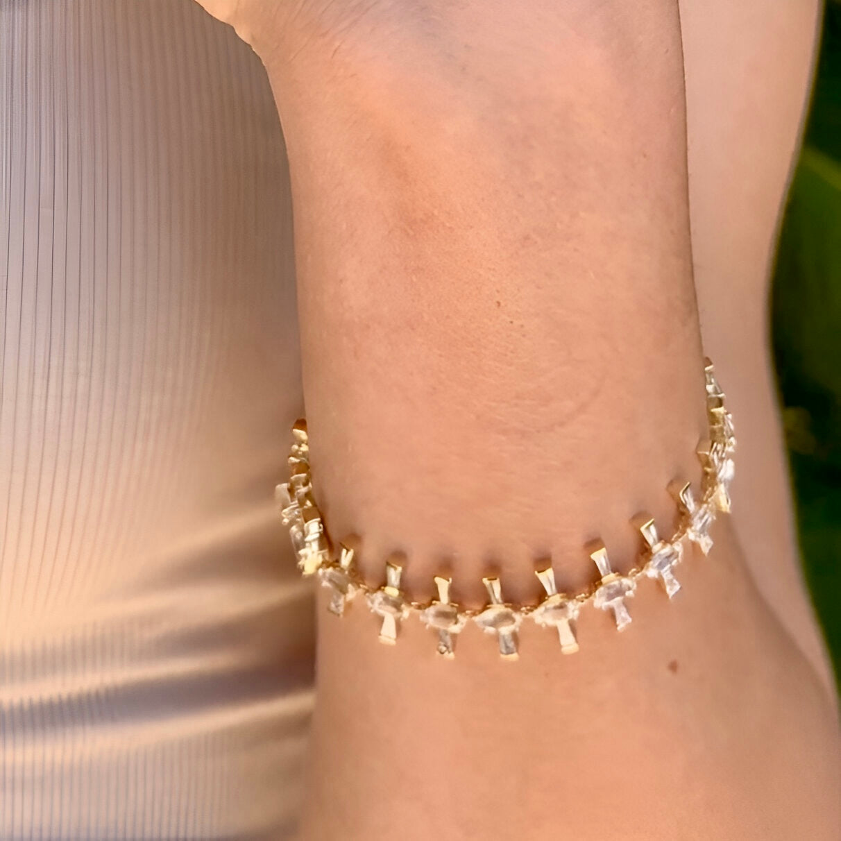 Supernova Diamond Sapphire Tennis Bracelet by Meredith Young, available at Talisman Collection Fine Jewelers in El Dorado Hills, CA and online. The Supernova Diamond Sapphire Tennis Bracelet stands as a shining example of elegance. Crafted in radiant 18k yellow gold, this exquisite piece features a breathtaking 11.5 cts of oval-cut white sapphires, gracefully flanked by 2.6 cts of tapered diamond baguettes. Inspired by celestial beauty, this bracelet is is out of the world!