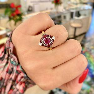 Heritage Ruby & Diamond Enamel Ring by Lord Jewelry available at Talisman Collection Fine Jewelers in El Dorado Hills, CA and online. This Heirloom Ruby Rock Candy Ring is truly special... The magnificent cocktail ring features a .69 ct ruby in the center, surrounded by .40 cts of rubies and .36 cts of diamonds, all set in 18k yellow gold accented with ruby red enamel. Red is the color of love for a reason...!
