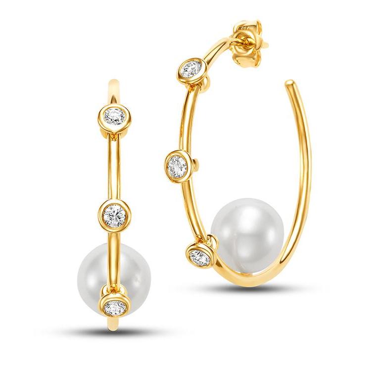 Freshwater Pearl and Diamond Hoop Earrings by Mastoloni available at Talisman Collection Fine Jewelers in El Dorado Hills, CA and online.These Freshwater Pearl and Diamond Hoop Earrings offer a blend of classic and modern style. Featuring 10 - 10.5 mm white freshwater pearls, the hoops are highlighted by bezel-set diamond stations totaling 0.50 cts. Designed in 18k yellow gold, they provide a refined look that transitions easily from day to night. 