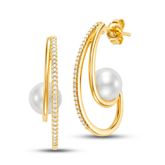 Freshwater Pearl and Diamond Sulptural Hoop Earrings by Mastoloni available at Talisman Collection Fine Jewelers in El Dorado Hills, CA and online. These hoop earrings sport a refreshing, modern design. Crafted in 14k yellow gold, each hoop features a 7-7.5 mm freshwater pearl, accented by a subtle touch of diamonds totaling 0.185 carats. The sculptural design adds an artistic flair, adding a refined but unique touch to any outfit. Whether worn day or night, these hoops offer a fresh take on classic pearl j