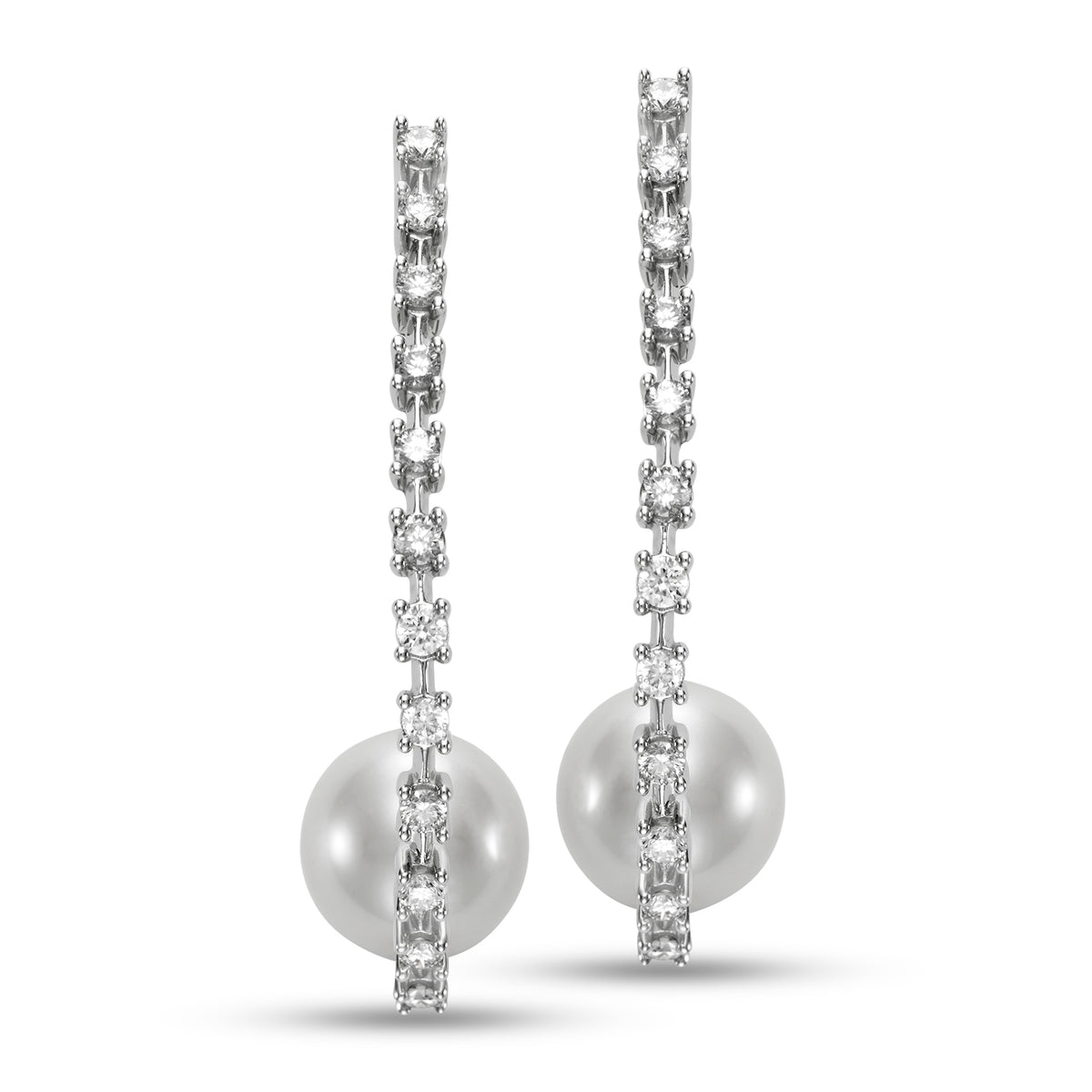 Pearl & Diamond Hoop Earrings by Mastoloni Pearls available at Talisman Collection Fine Jewelers in El Dorado Hills, CA and online. Crafted with precision and elegance, these 18k white gold hoop earrings feature a dazzling .75 carats of diamonds and timeless 10 - 10.5 mm freshwater pearls. Each element is meticulously chosen to create an elegant and timeless piece of jewelry that is sure to be loved for eternity. 