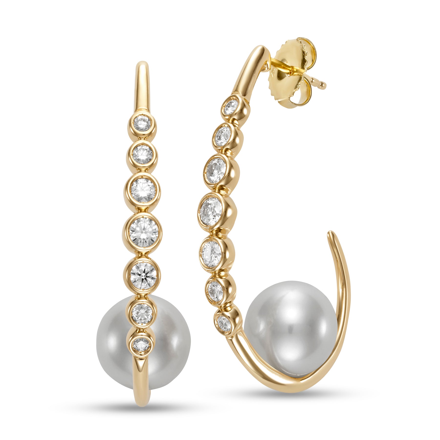 Riviera Diamond & Pearl Hoop Earings by Mastoloni available at Talisman Collection Fine Jewelers in El Dorado Hills, CA and online. Embrace your inner grace with the breathtaking Riviera Hoop Earrings. A decadent combination of 10.5-11mm freshwater pearls and .75 carats of sparkling white diamonds, set in 18k yellow gold. A true masterpiece of art and craftsmanship, designed for those who appreciate timeless elegance and the finest things in life.
