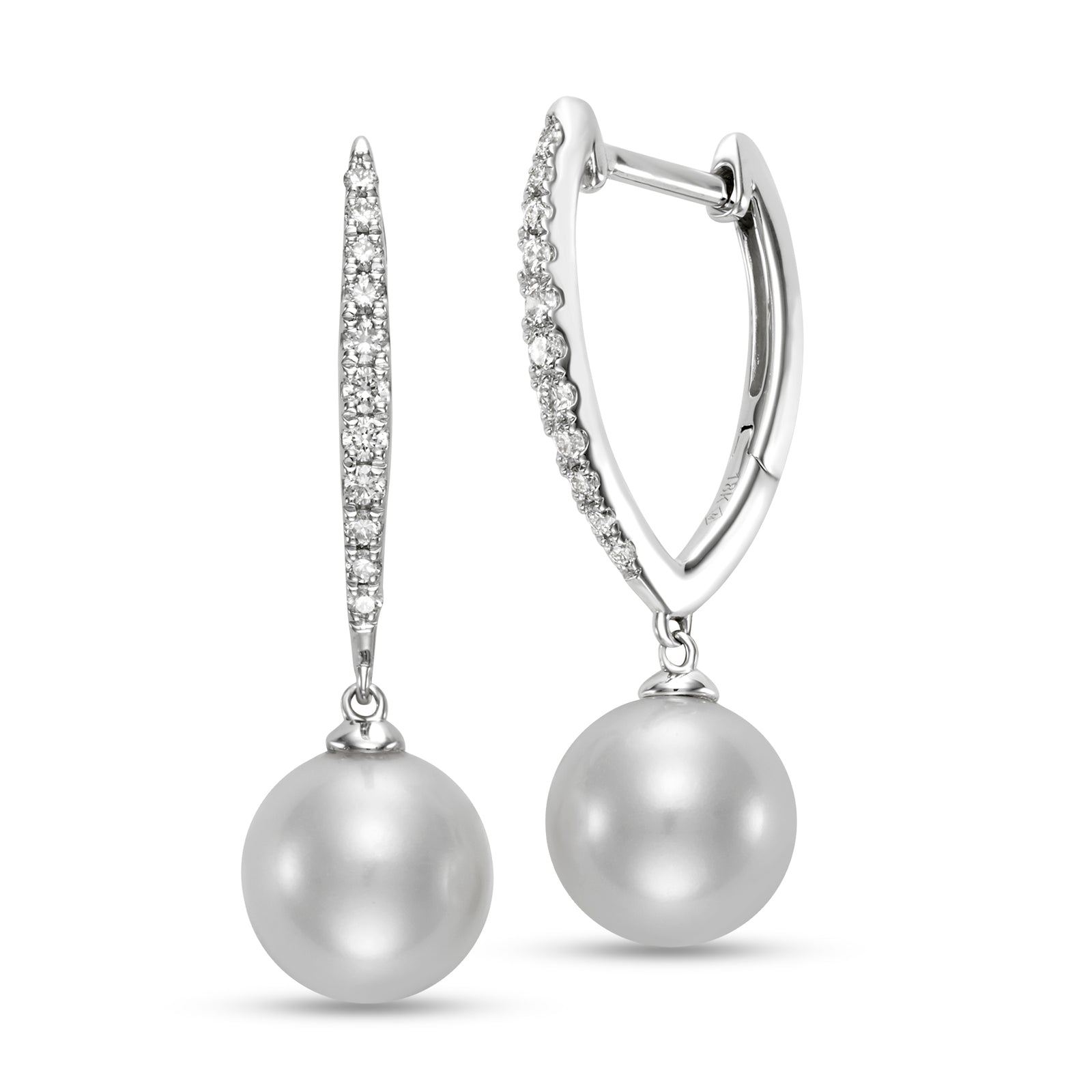 Pave Diamond & Pearl Huggie Earrings by Mastoloni available at Talisman Collection Fine Jewelers in El Dorado Hills, CA and online. Experience the luxurious beauty of our Pave Diamond & Pearl Huggie Earrings, crafted with 9-9.5 mm freshwater pearls and .25 carats of stunning diamonds, set in 18k white gold.