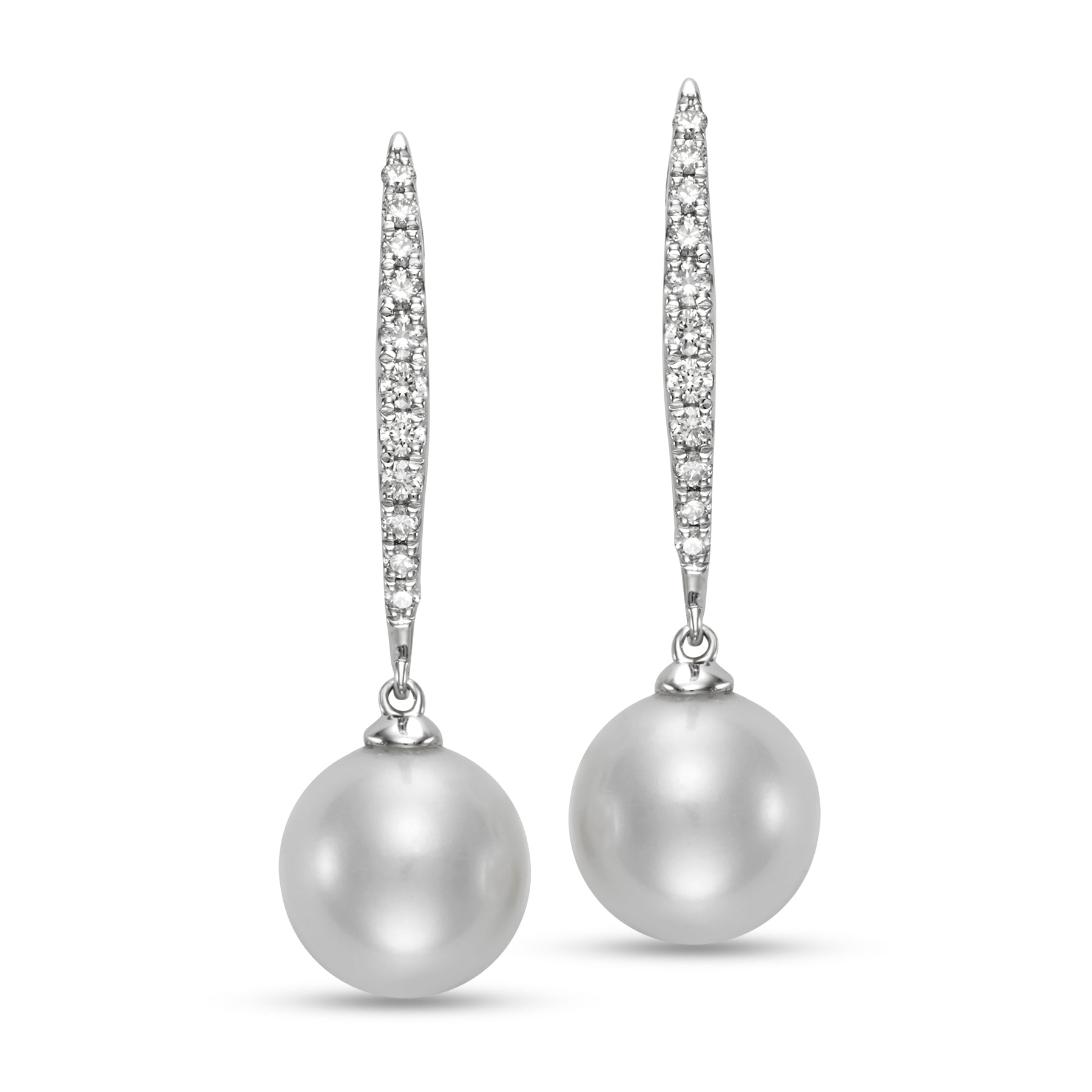 Pave Diamond & Pearl Huggie Earrings by Mastoloni available at Talisman Collection Fine Jewelers in El Dorado Hills, CA and online. Experience the luxurious beauty of our Pave Diamond & Pearl Huggie Earrings, crafted with 9-9.5 mm freshwater pearls and .25 carats of stunning diamonds, set in 18k white gold.