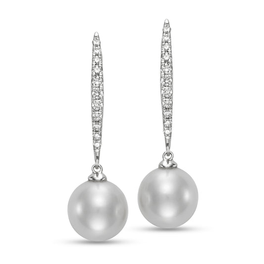 Pave Diamond & Pearl Huggie Earrings by Mastoloni available at Talisman Collection Fine Jewelers in El Dorado Hills, CA and online. Experience the luxurious beauty of our Pave Diamond & Pearl Huggie Earrings, crafted with 9-9.5 mm freshwater pearls and .25 carats of stunning diamonds, set in 18k white gold.