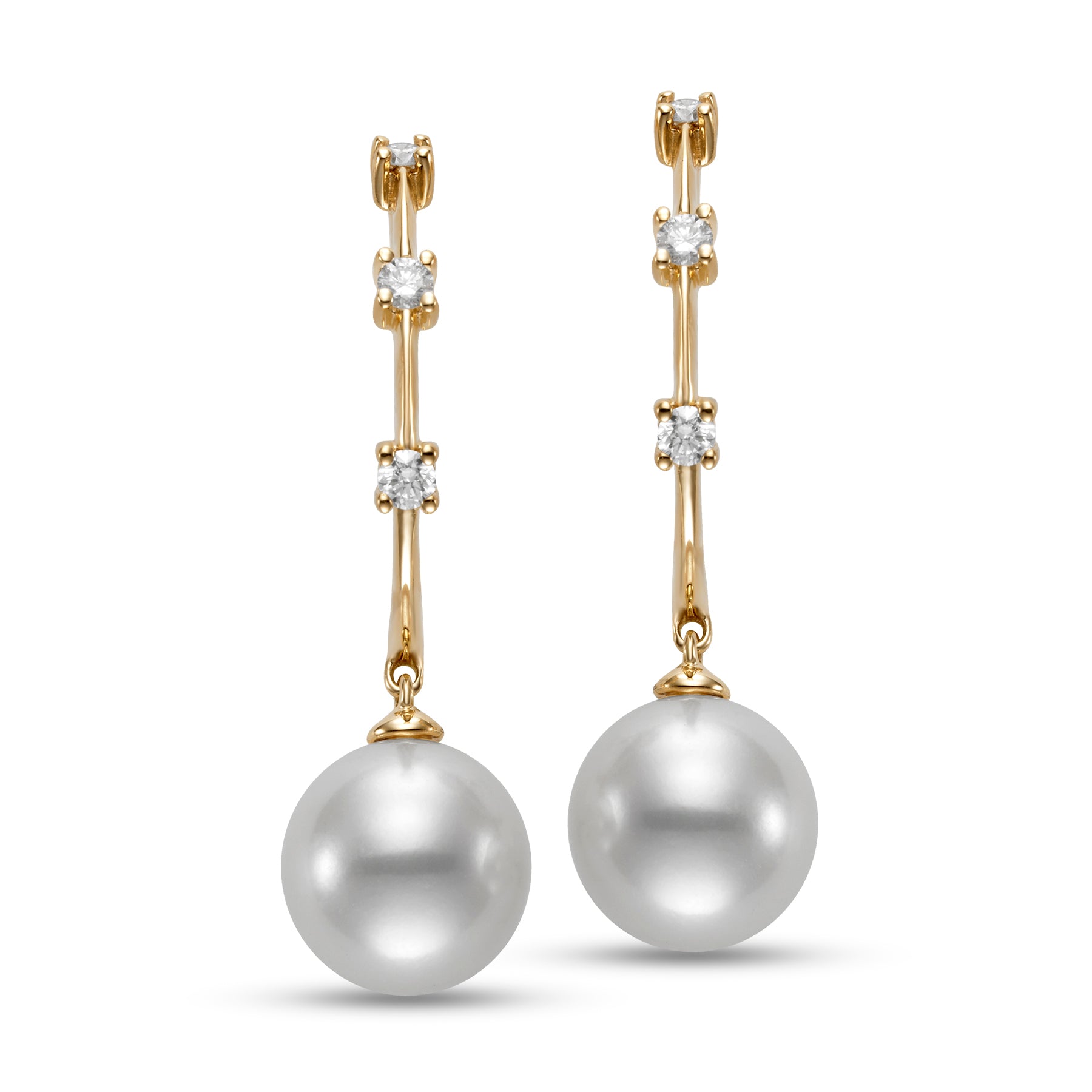 Tre Diamond & Pearl Hoop Earrings by Mastoloni available at Talisman Collection Fine Jewelers in El Dorado Hills, CA and online. Experience true luxury with the Tre Diamond & Pearl Hoop Earrings by Mastoloni. Crafted with 18K yellow gold, these hoops feature three dazzling diamonds totaling .20 cts and stunning 9-9.5mm freshwater pearls. A design that will never fade, these earrings are a must-have for those who value style and sophistication.
