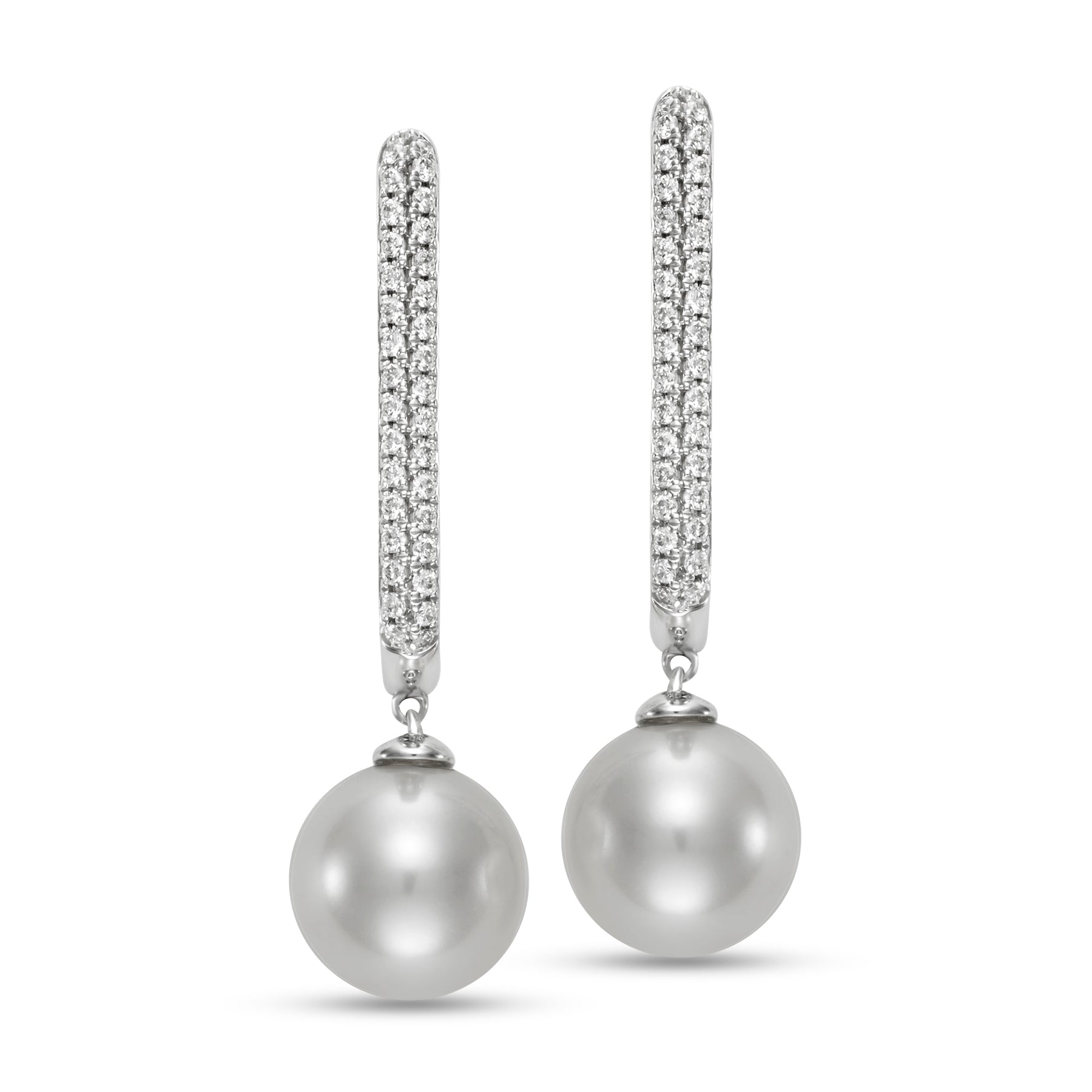 Pave Diamond & Pearl Hoop Earrings by Mastoloni available at Talisman Collection Fine Jewelers in El Dorado Hills, CA and online. Expertly crafted with .27 carats of pavé diamonds set in 18 karat white gold, these earrings are made even more elegant by the addition of 9-9.5 mm freshwater pearls. A stunning combination of precious materials that come together in these classic hoops. 