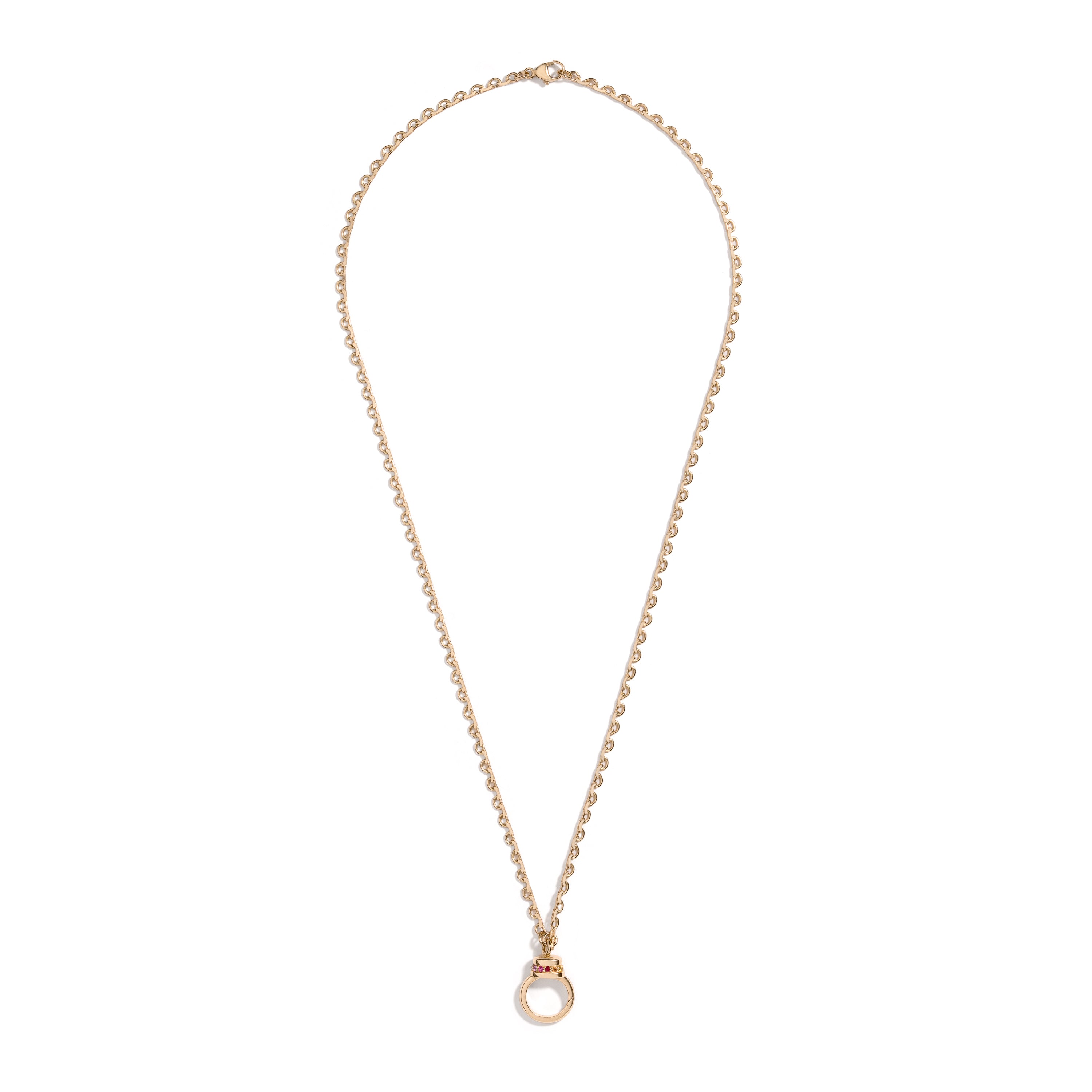 Lace Chain Pendant Holder by Mined + Found available at Talisman Collection Fine Jewelers in El Dorado Hills, CA and online. Inspired by delicately scalloped lace, the 14k gold chain is meticulously finished with a traditional diamond-cut surface, reflecting a subtle glimmer as it catches the light. The gemstone clasp features a sparkling rainbow of gemstones, reversing to show either a band of "cool" colors or "warm" colors. The 18" necklace has a front facing lobster clasp that pairs perfectly with a 