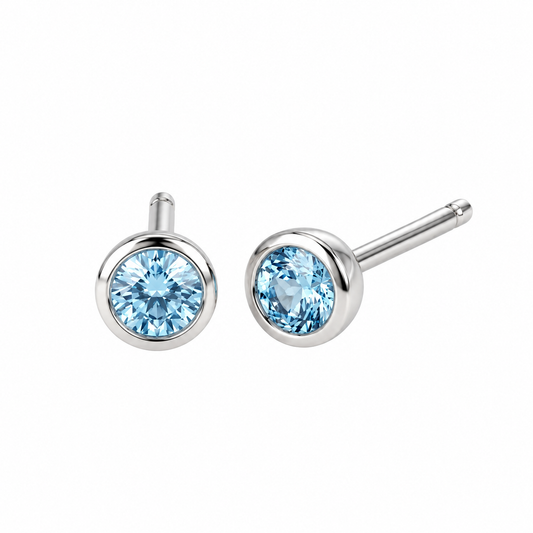 Ostbye Blue Topaz Bezel Stud Earrings