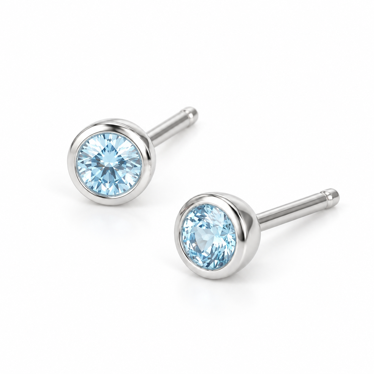 Ostbye Blue Topaz Bezel Stud Earrings