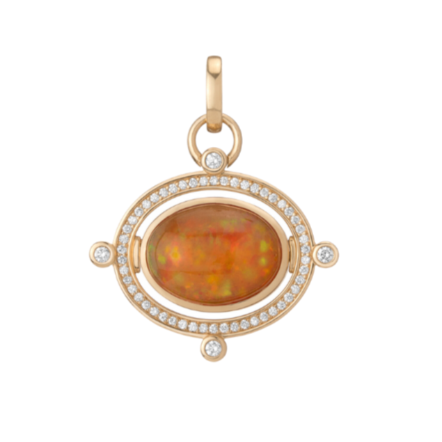 Fire Opal Compass Pendant by Mined + Found available at Talisman Collection Fine Jewelers in El Dorado Hills, CA and online. A change of direction can be a very good thing, and our one-of-a-kind Compass pendant illustrates just that. With one quick twist, the Compass pendant reverses from glowing 4.44 ct fire opal to smooth, satiny 14k gold, engraved with an antique compass rose inspired motif. A ring of sparkling pavé diamonds, and four bezel set diamonds -representative of the four cardinal directions- to