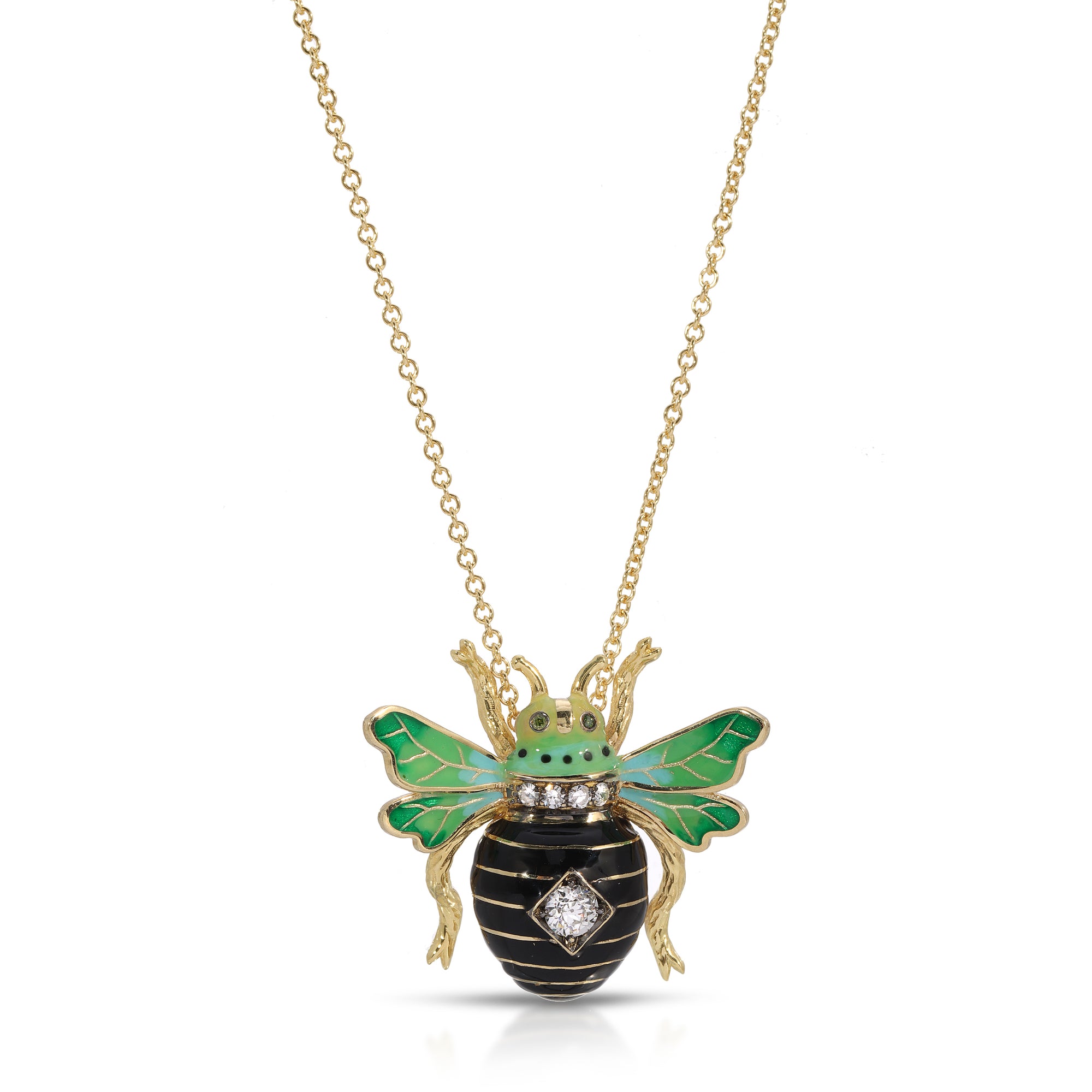 Queen Bee Pendant Necklace by Lord Jewelry available at Talisman Collection Fine Jewelers in El Dorado Hills, CA and online. A classic and often preppy motif, this delightful 18k enamel bumble bee necklace gets the royal treatment! Featuring ombre green wings and a black body, she is accented with a 0.41 carat diamond for a touch of sparkle. Worn alone or layered, this regal 18" necklace will add a touch of playfulness to your look.