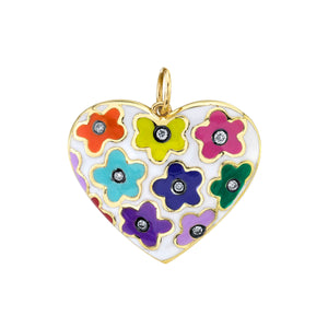 Enamel Flower Heart Pendant by Lord Jewelry available at Talisman Collection Fine Jewelers in El Dorado Hills, CA and online. This 18k gold, white enamel heart pendant is a vibrant piece with a retro, pop art feel. This pendant features charming colored flowers, each with a sparkling diamond center totaling .12 carats. It's a playful and unique accessory that adds a burst of color and whimsy; perfect for those who appreciate a touch of joyful individuality.