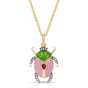 Ruby Enamel Beetle Necklace by Lord Jewelry available at Talisman Collection Fine Jewelers in El Dorado Hills, CA and online. This Ruby Scarab Beetle Pendant Necklace is utterly charming. Crafted in 18k yellow gold, the charm features a beautiful plique-à-jour enamel scarab, accented with a 0.19 cts pear-cut ruby and 0.14 cts of diamonds. 
