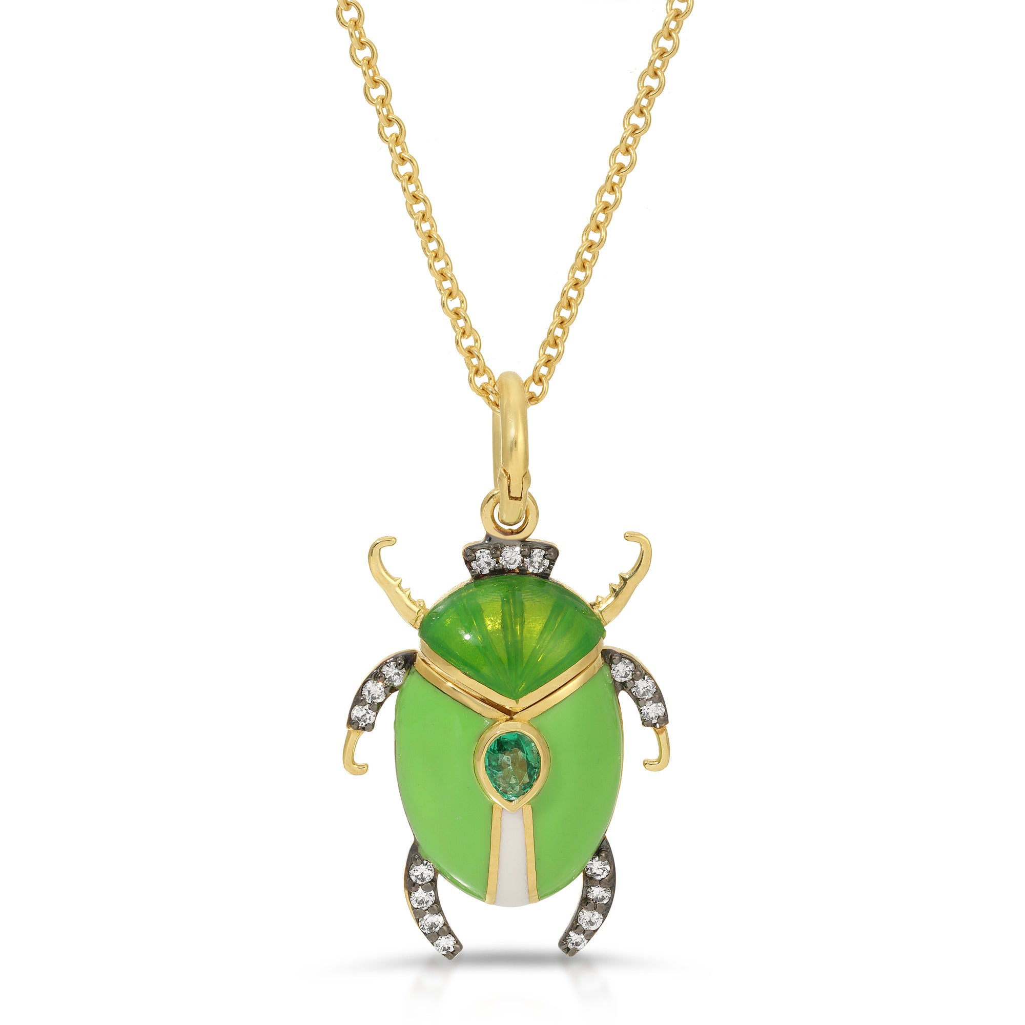 Emerald Enamel Beetle Necklace by Lord Jewelry available at Talisman Collection Fine Jewelers in El Dorado Hills, CA and online.Embrace the allure of ancient Egypt with the Emerald Scarab Beetle Pendant Necklace. Crafted in luxurious 18k yellow gold, this captivating charm showcases a stunning plique-à-jour enamel scarab, meticulously accented with a 0.19 carat pear-cut emerald and 0.14 carats of shimmering diamonds. 